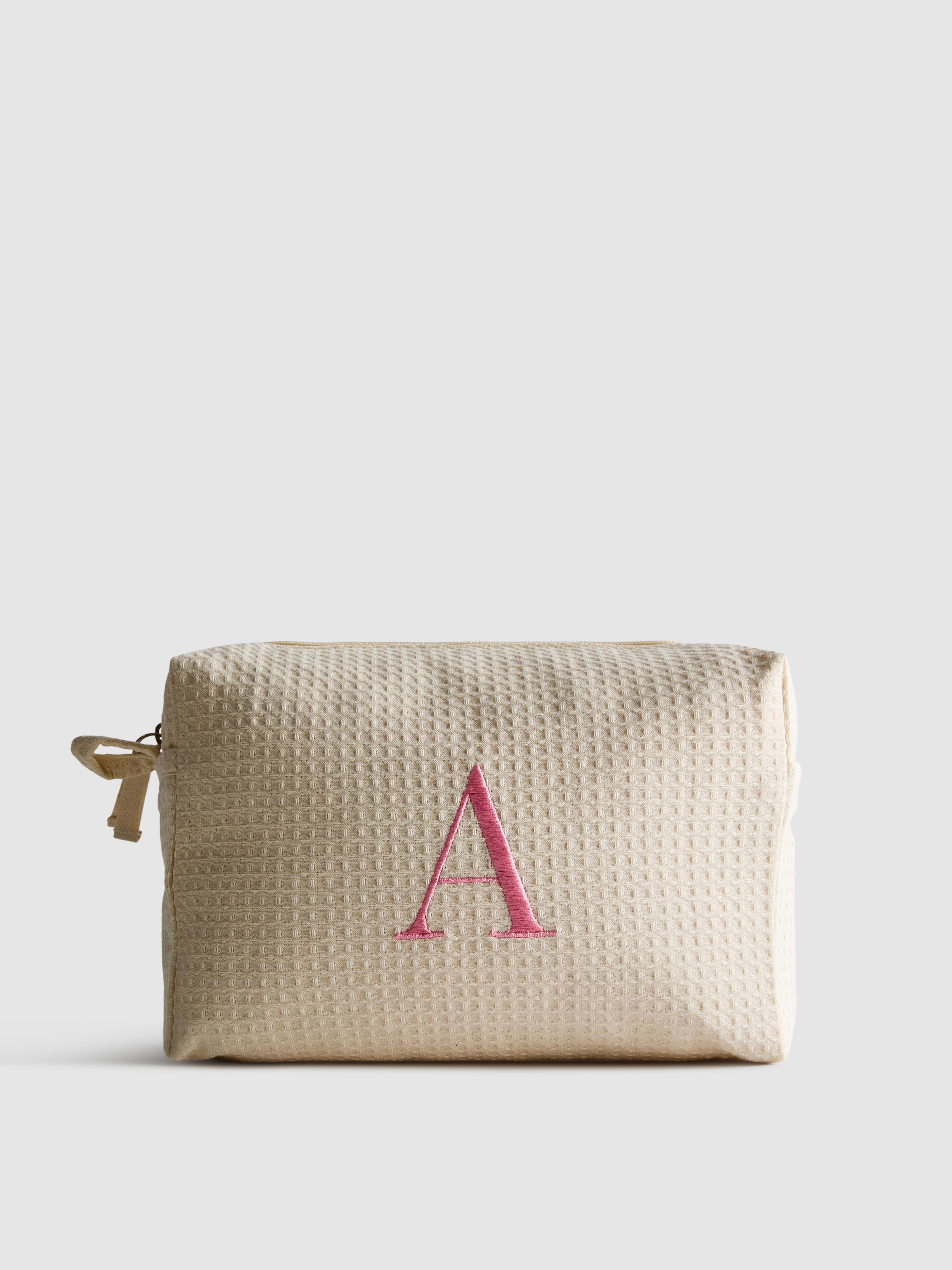 Bolsa para cosméticos gofrada con inicial