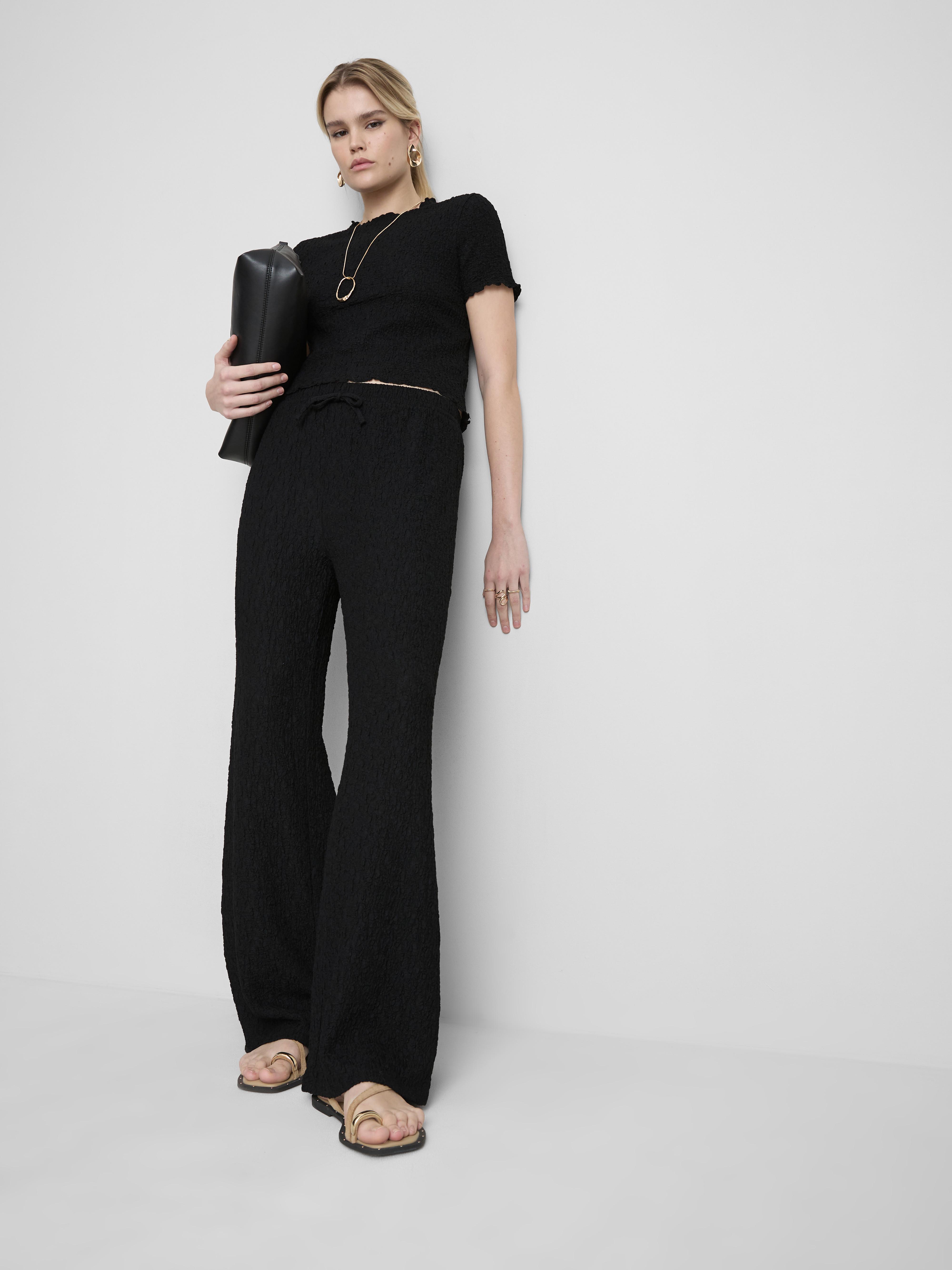 Marszczone spodnie z prostą nogawką i sznurkiem