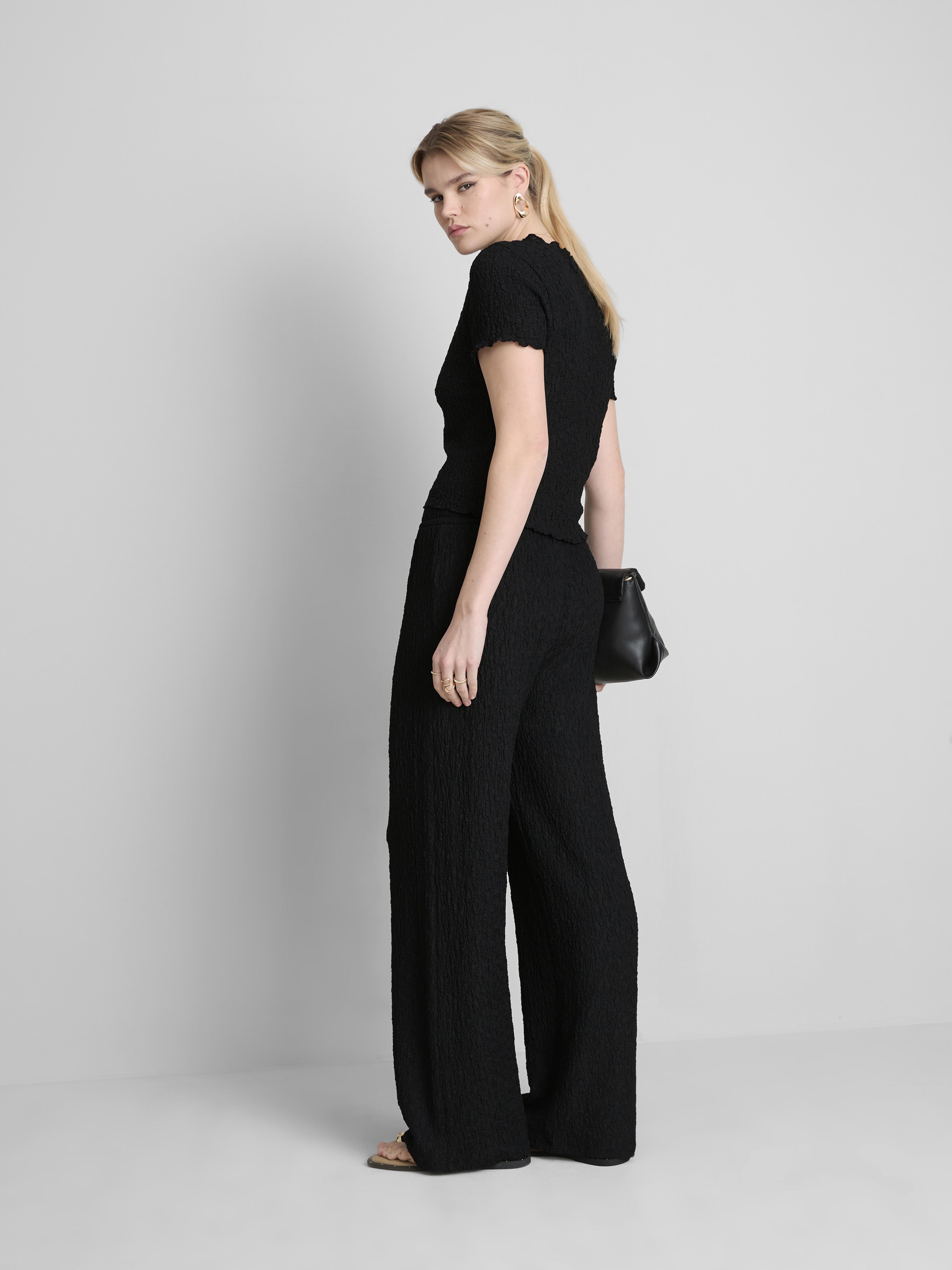 Marszczone spodnie z prostą nogawką i sznurkiem