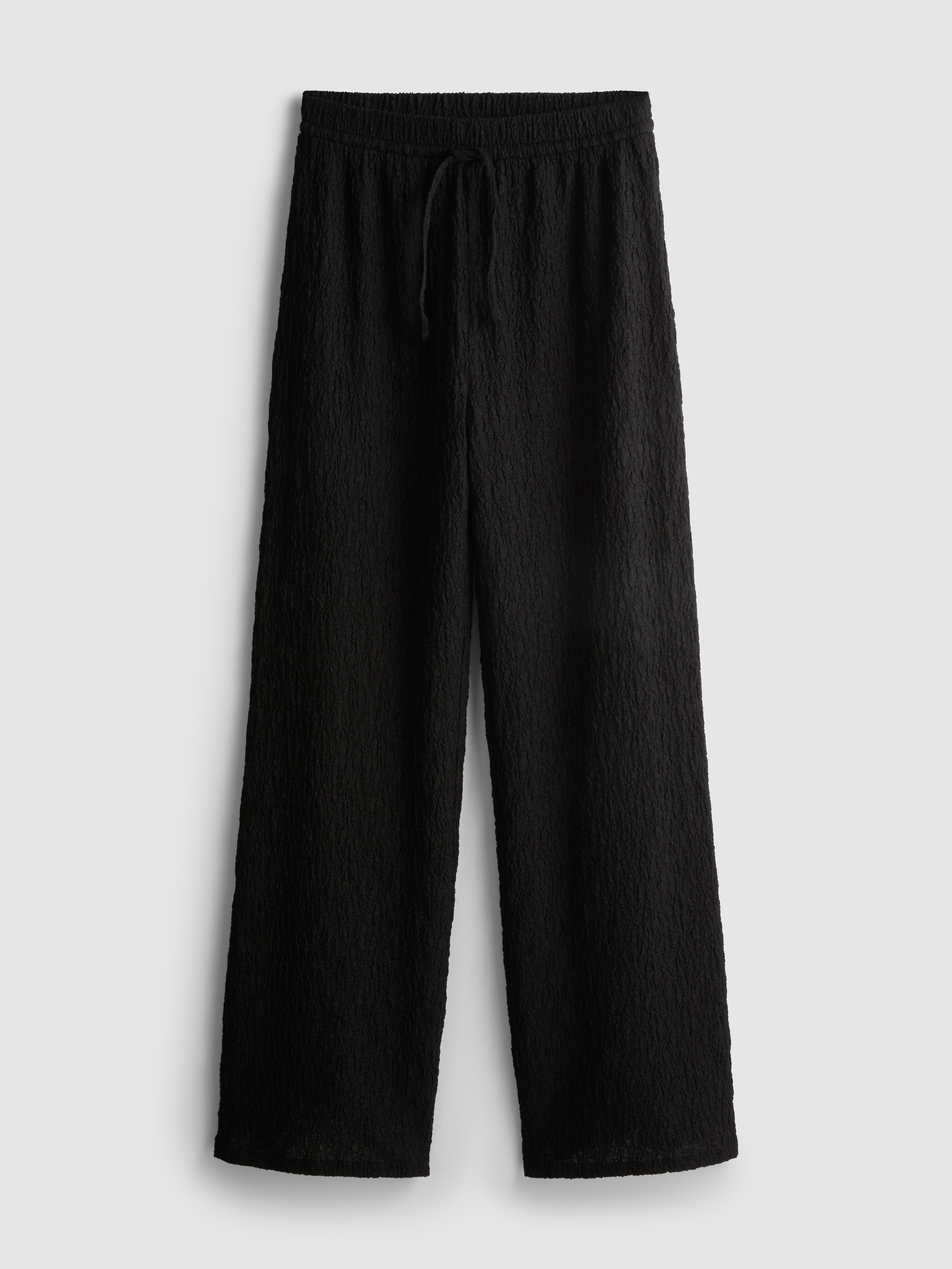 Marszczone spodnie z prostą nogawką i sznurkiem