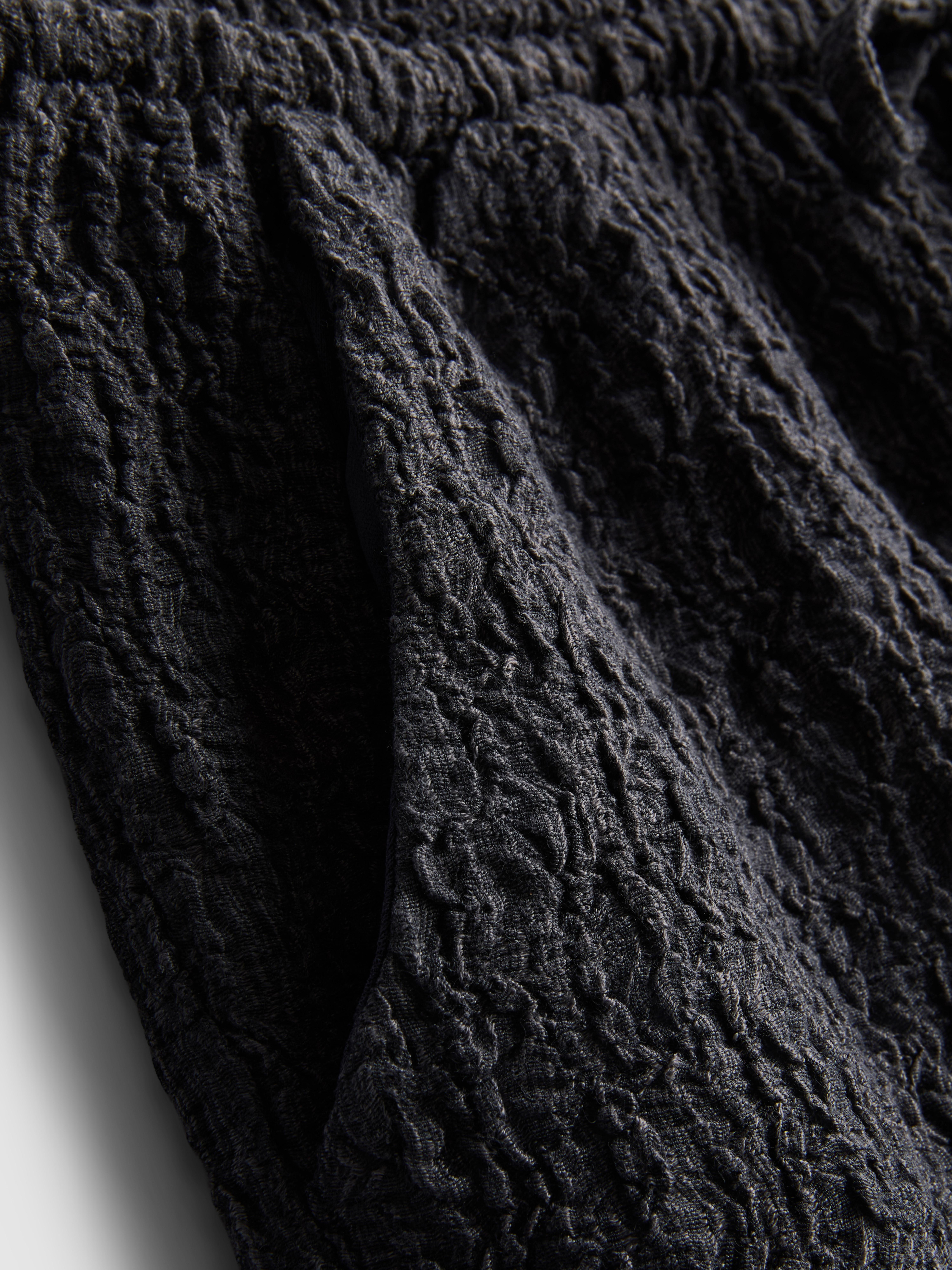 Pantaloncini increspati con elastico