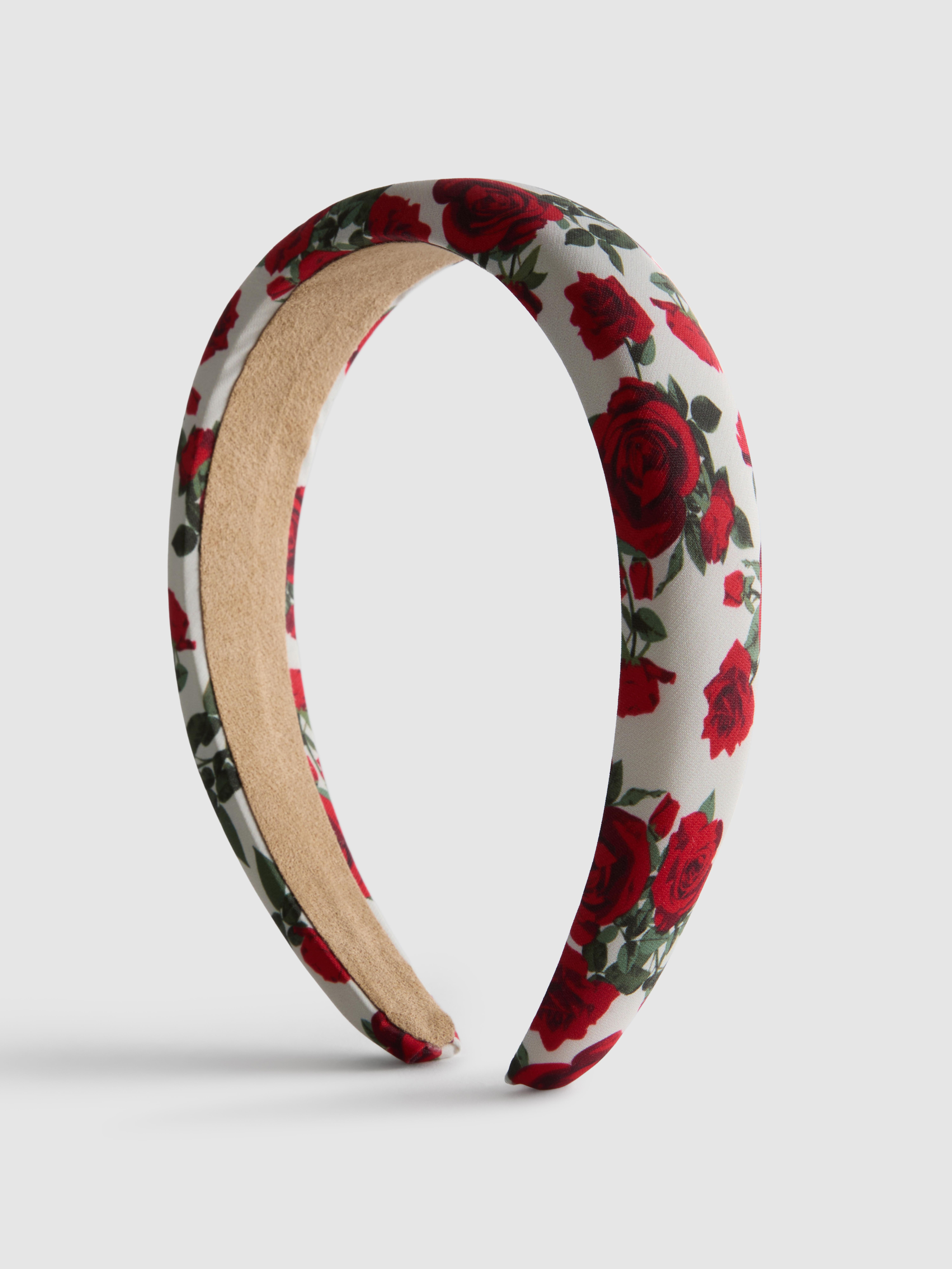 Serre-tête à imprimé rose