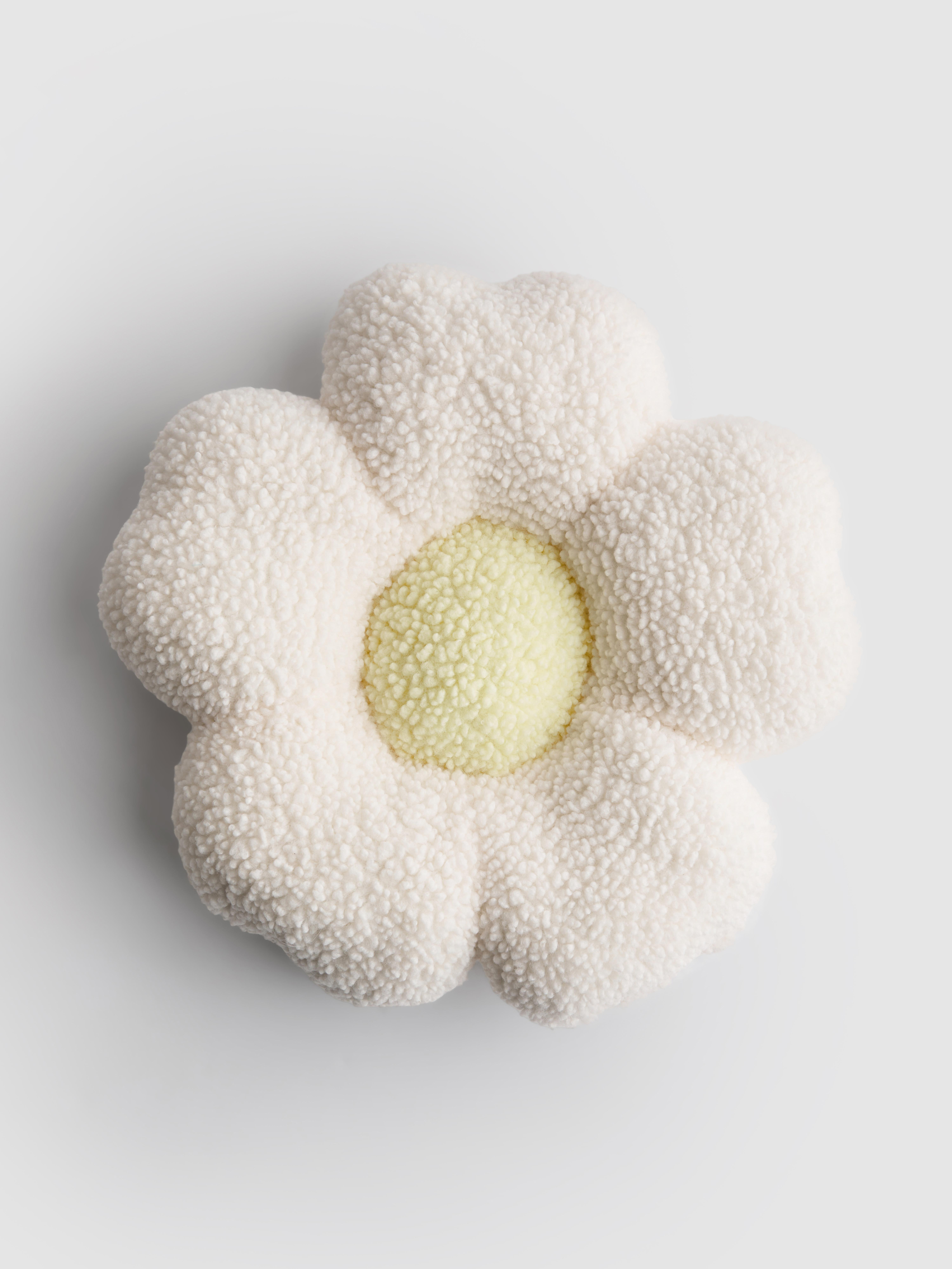 Gänseblümchenförmiges Bouclé-Kissen