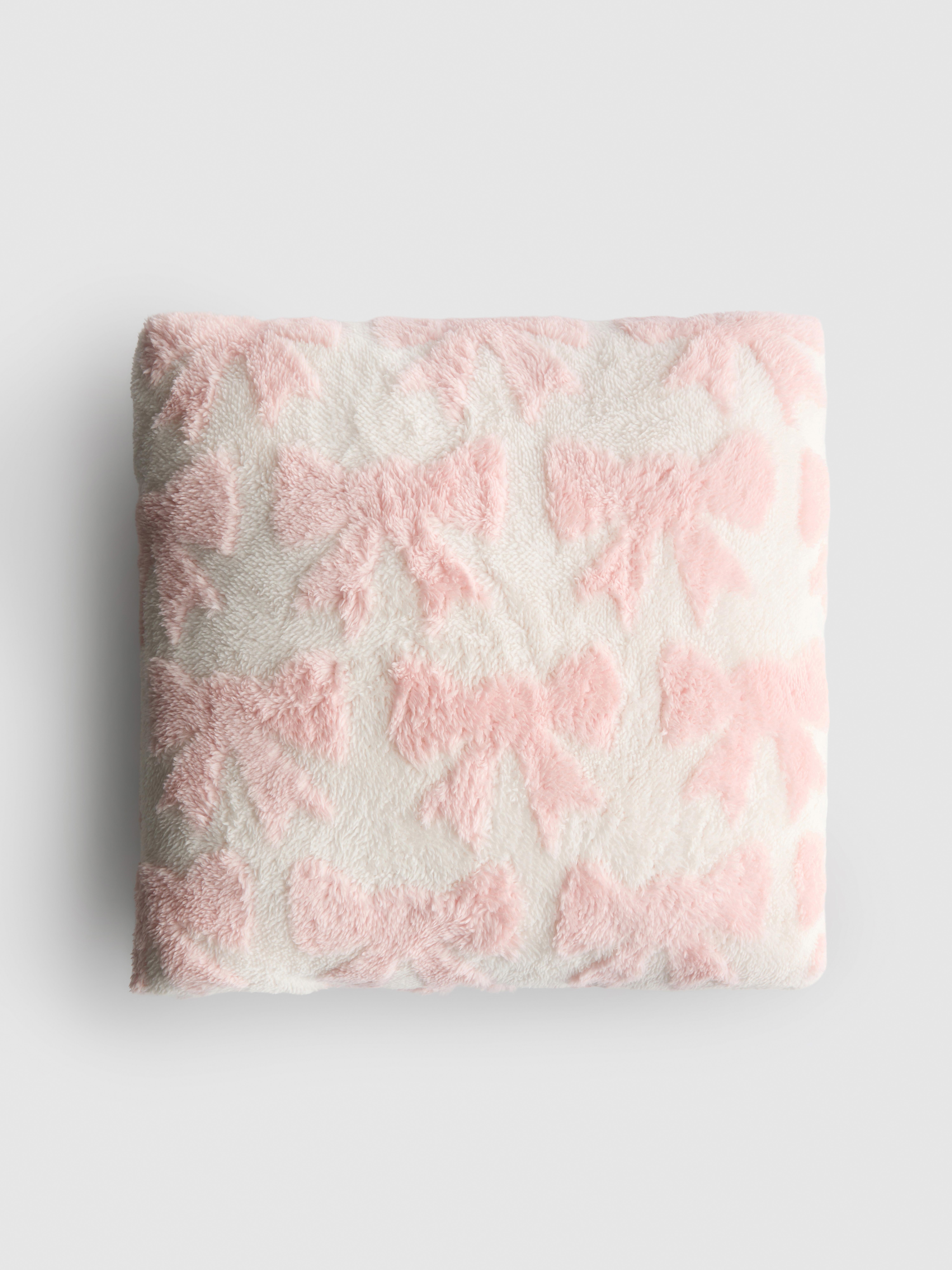 Vierkant kussen met strikjespatroon