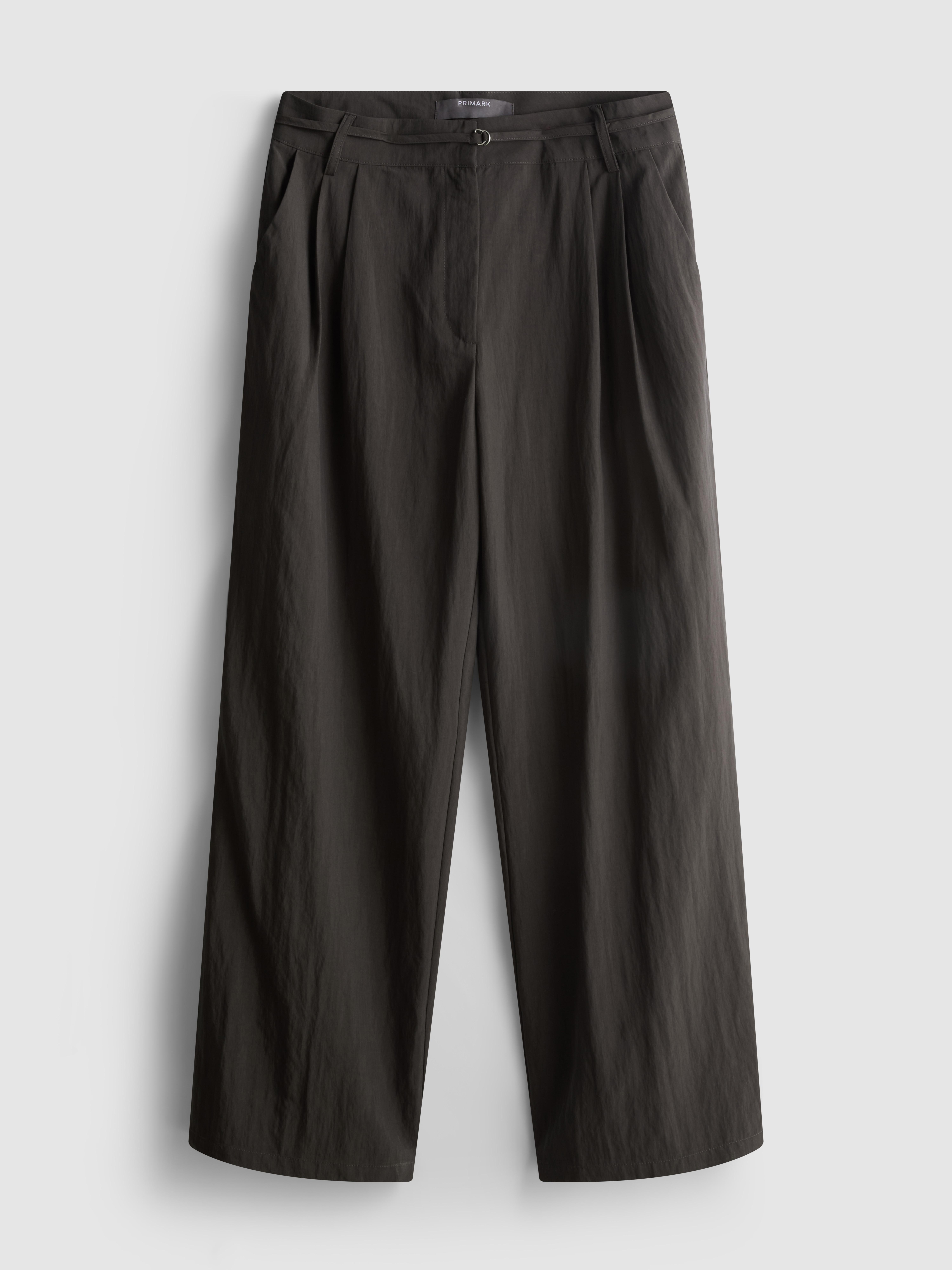 Broek met wijde pijpen en ceintuur