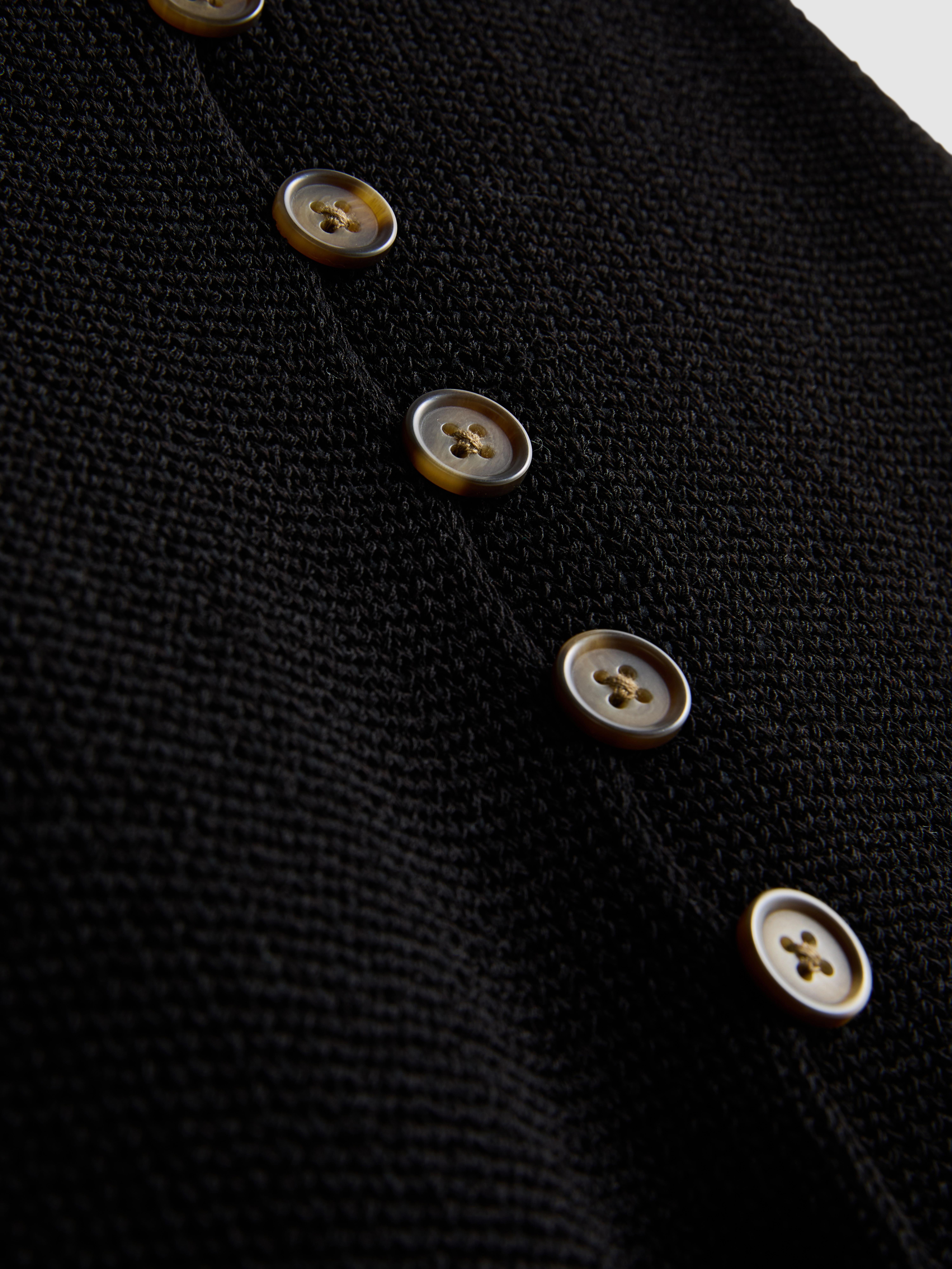 7–15 Jahre | Strickweste mit V-Ausschnitt