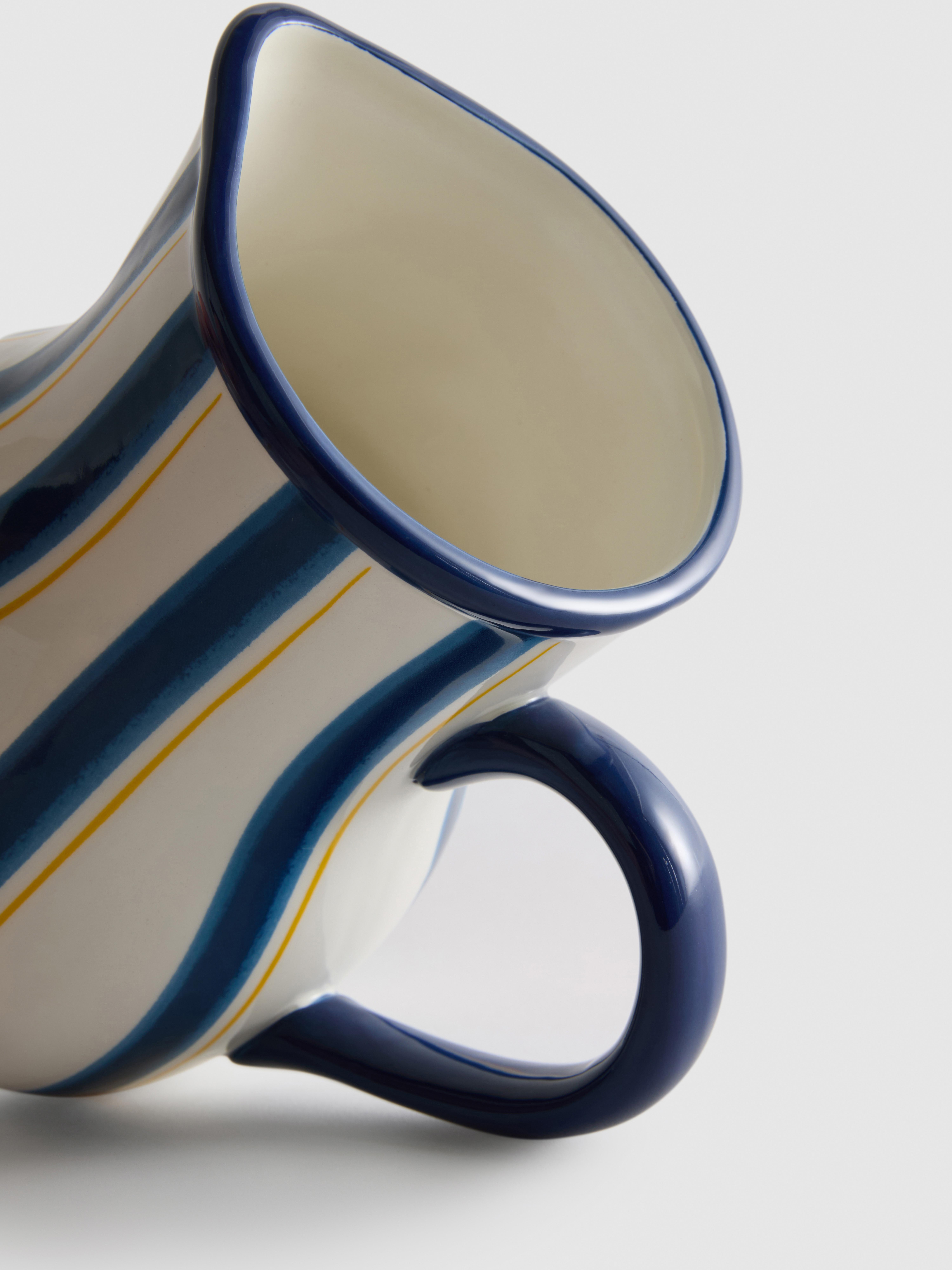 Gestreepte kan in mediterrane stijl