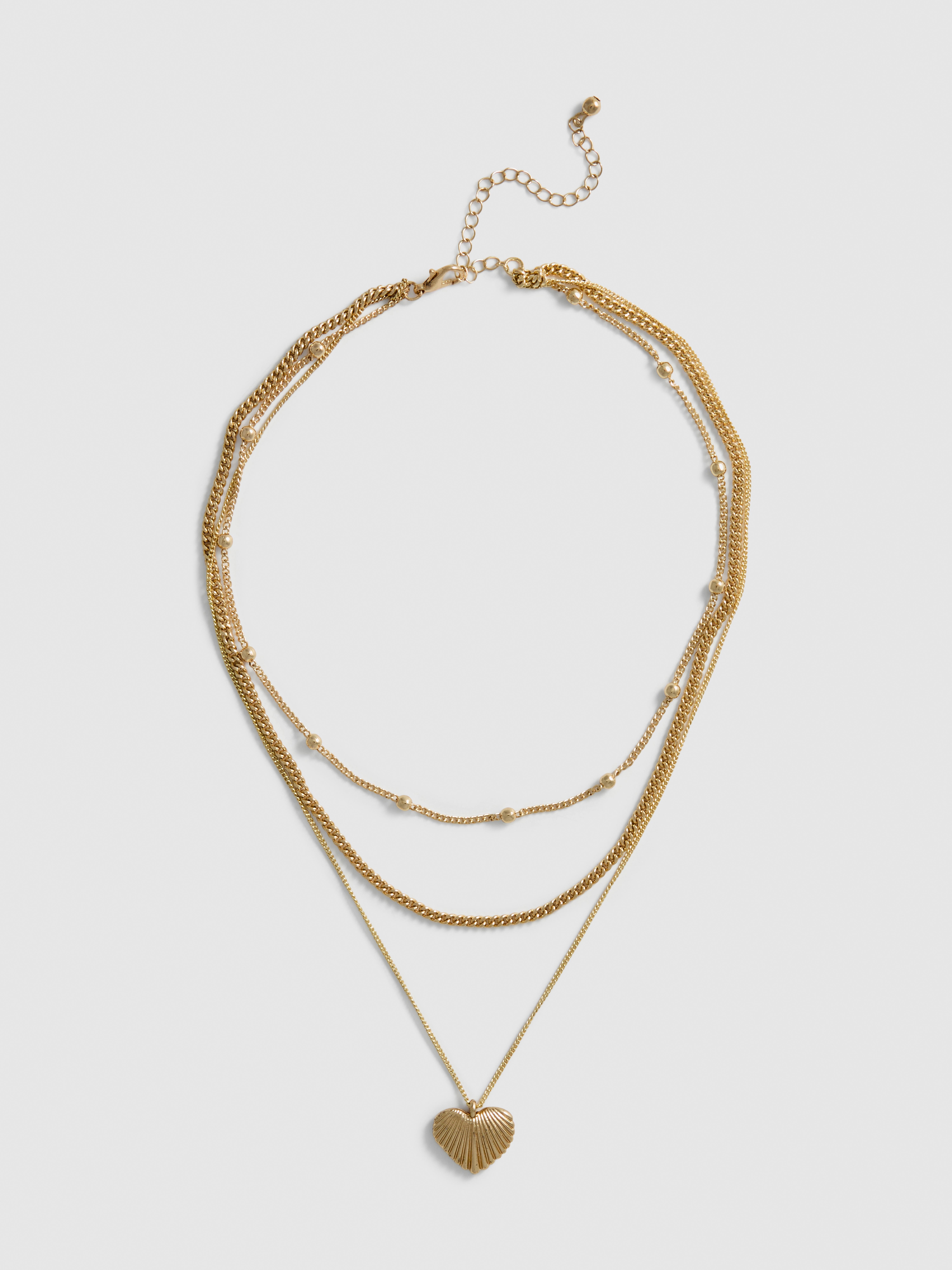 Collier à superpositions et pendentif coquillage