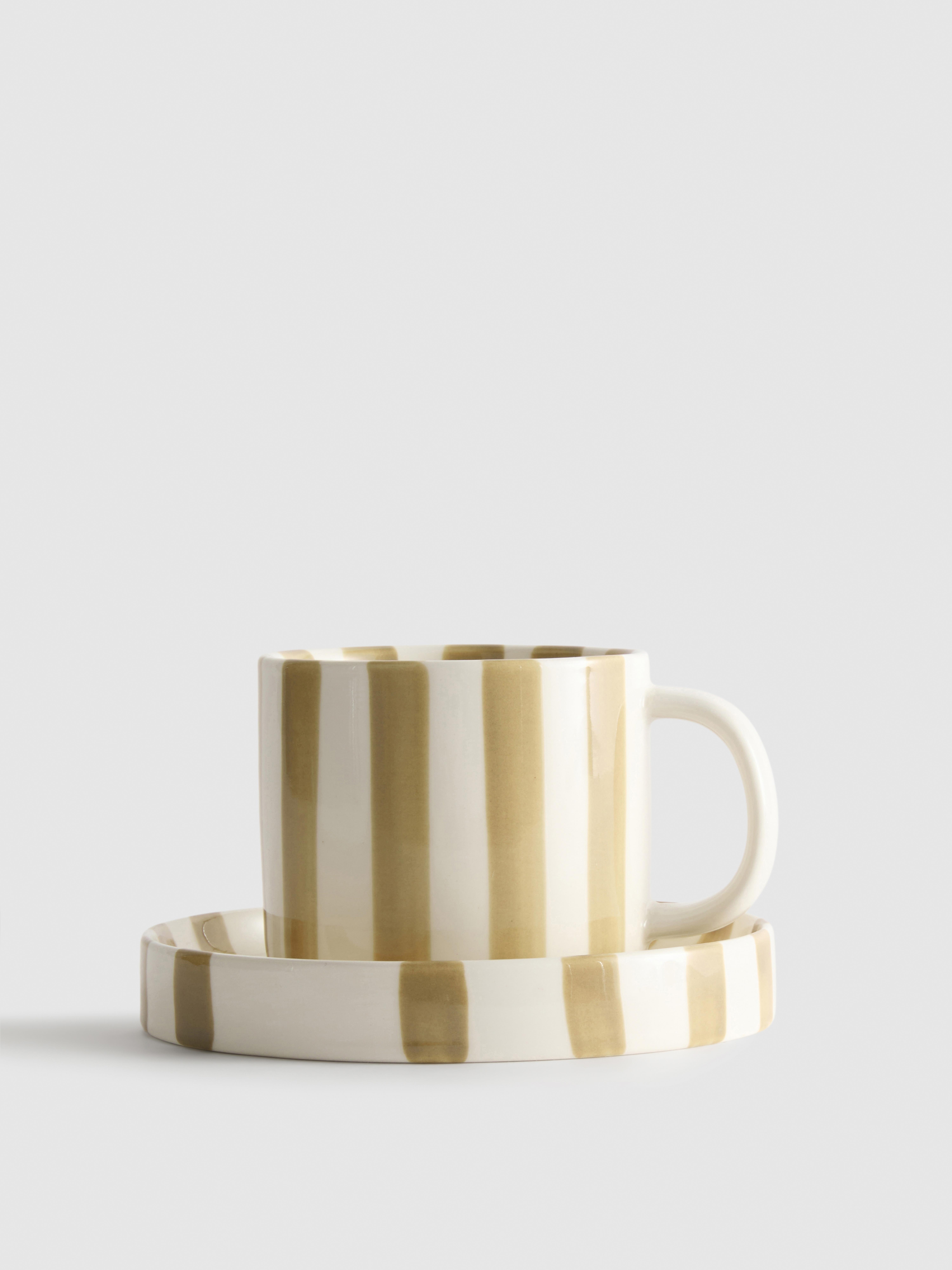 Gestreepte espressokop en -schotel