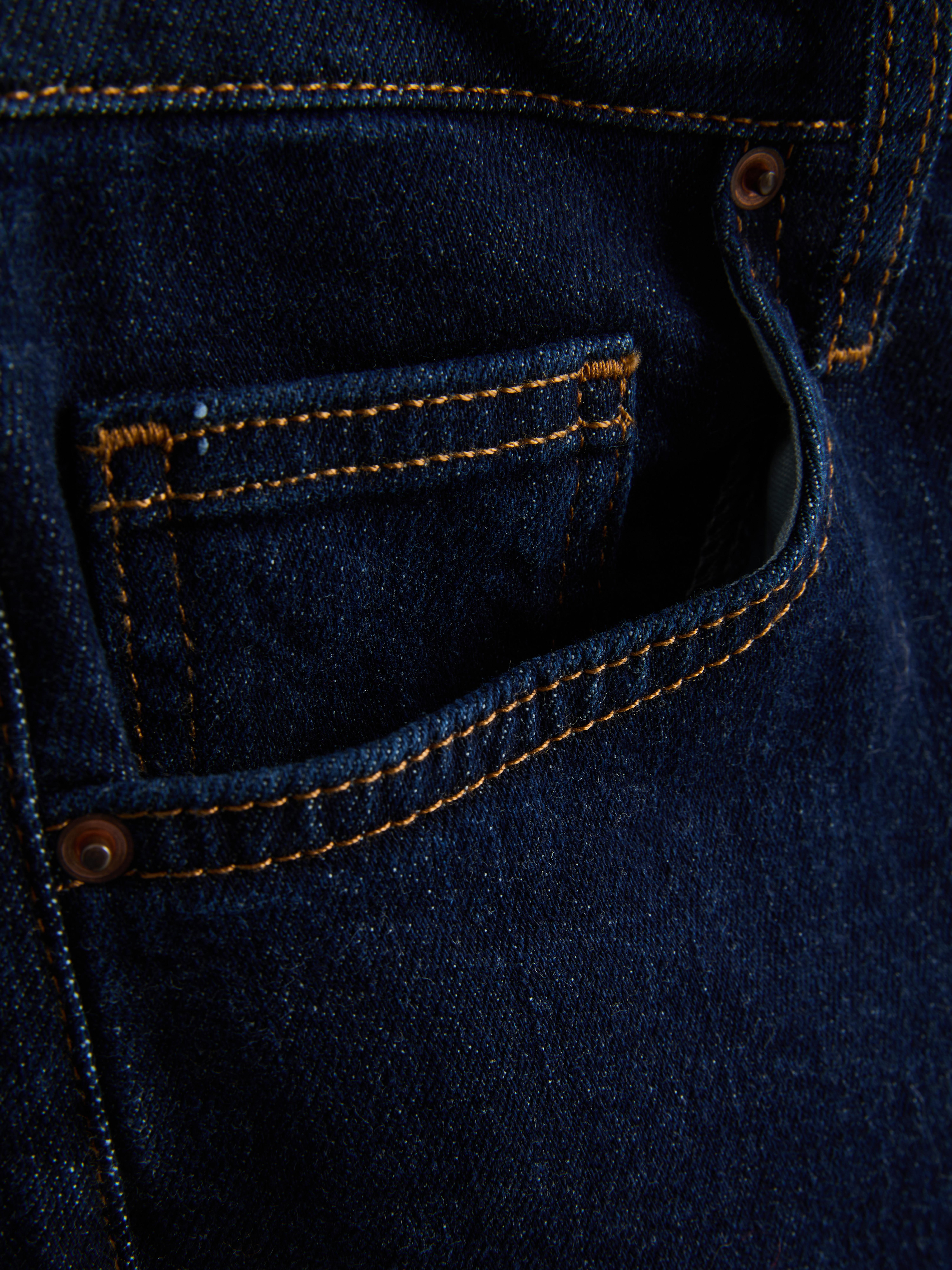 Halfhoge jeans met uitlopende pijpen