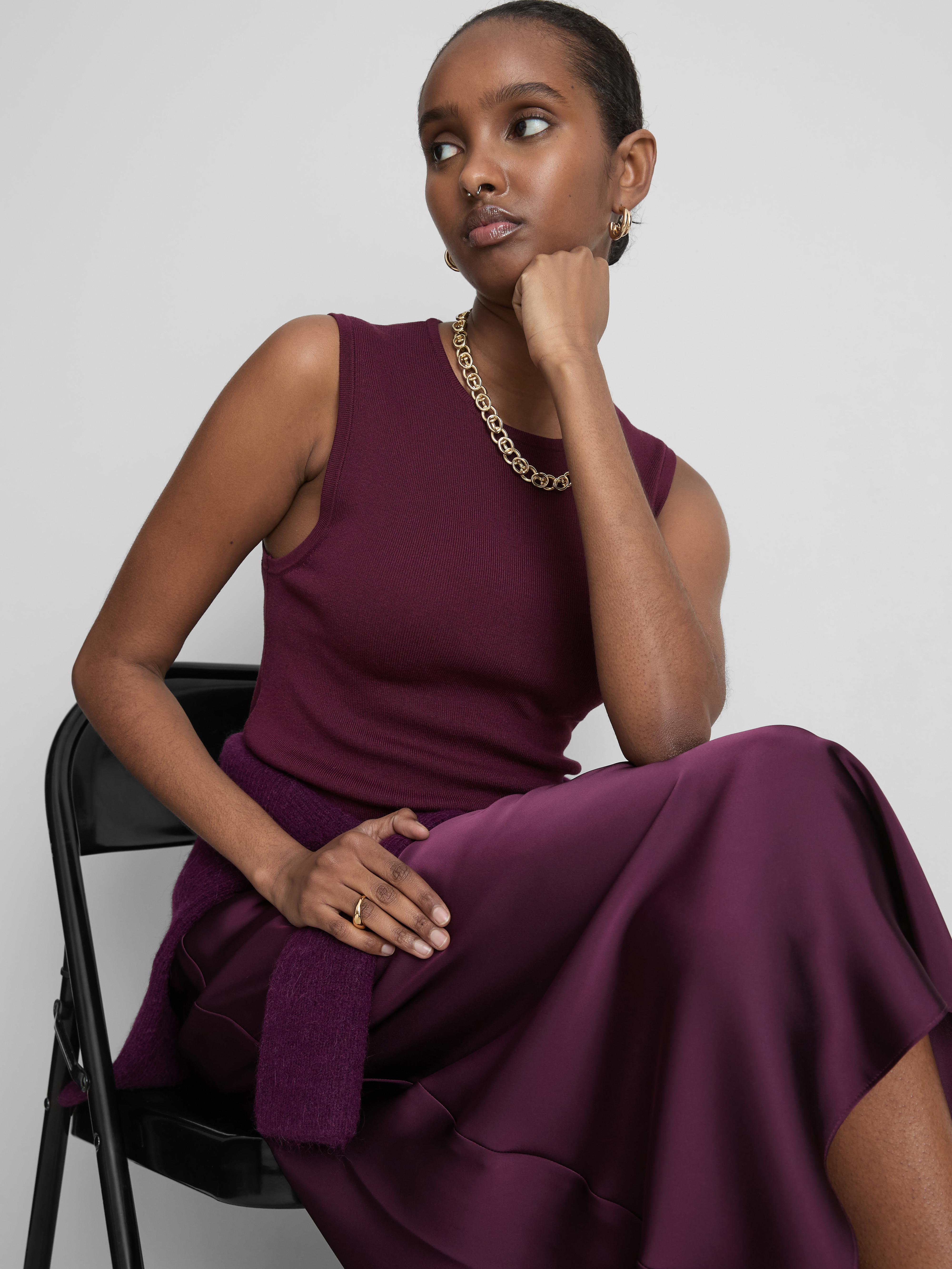 Dolga pletena majica brez rokavov