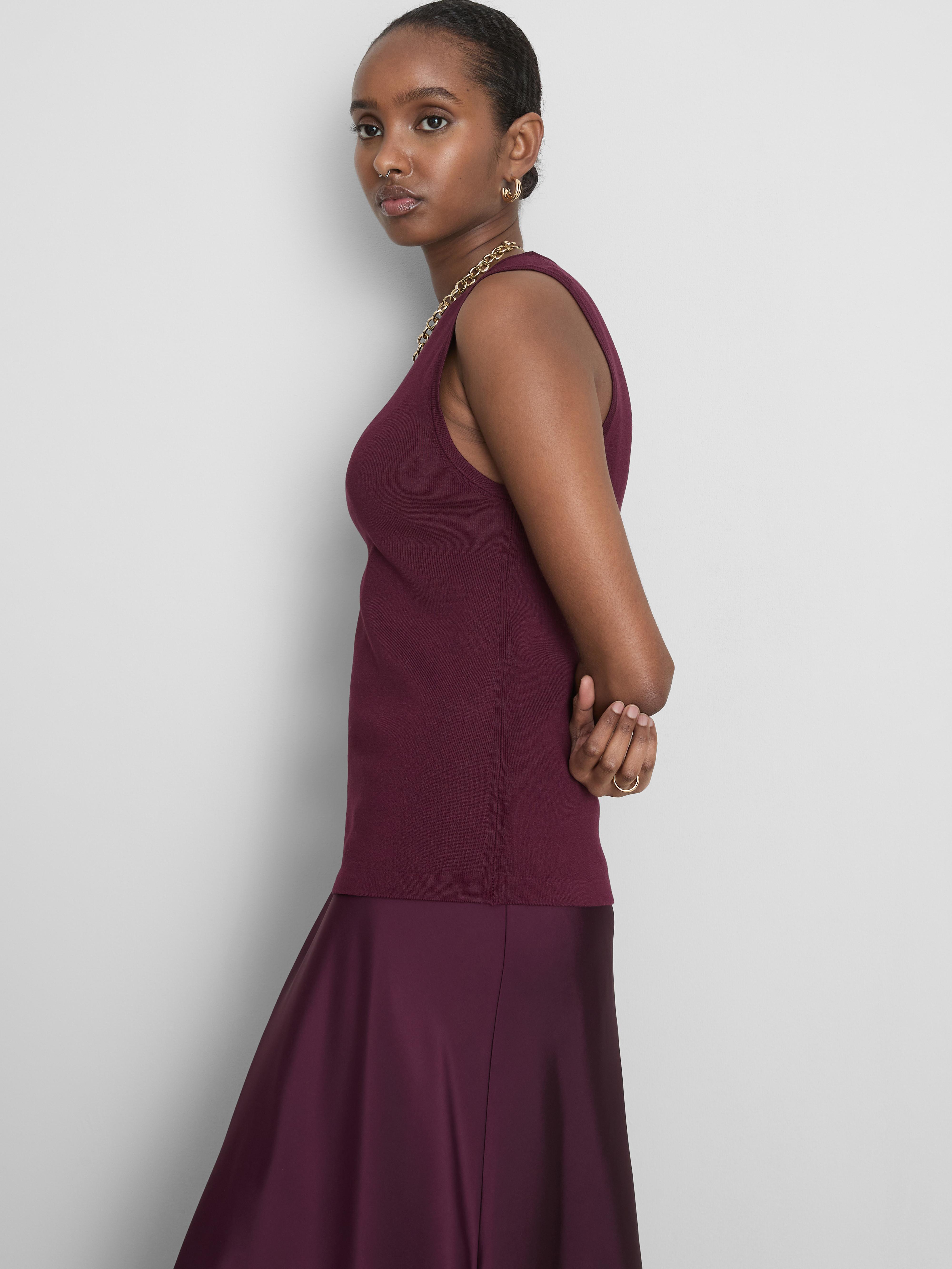 Dolga pletena majica brez rokavov