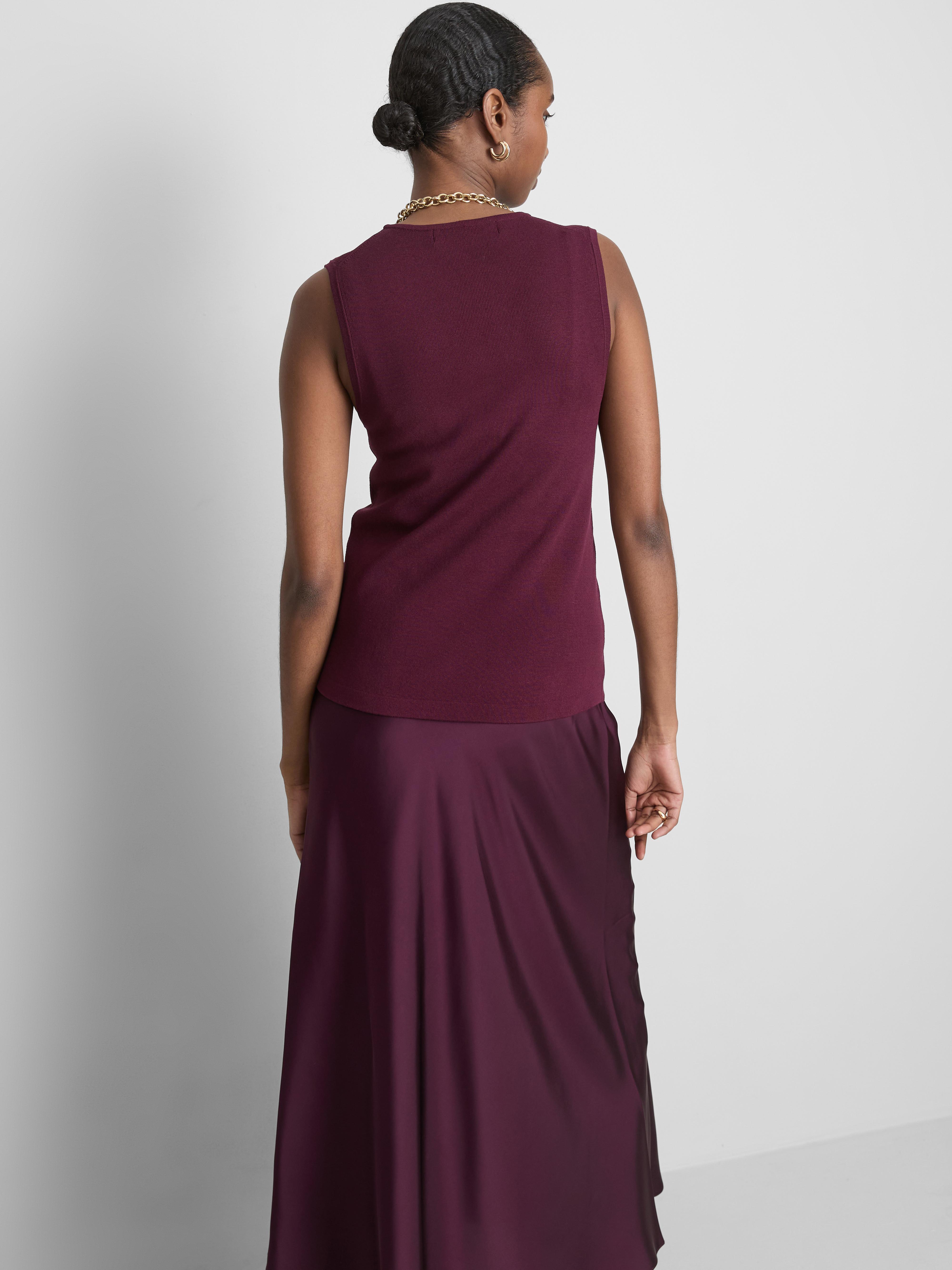 Dolga pletena majica brez rokavov