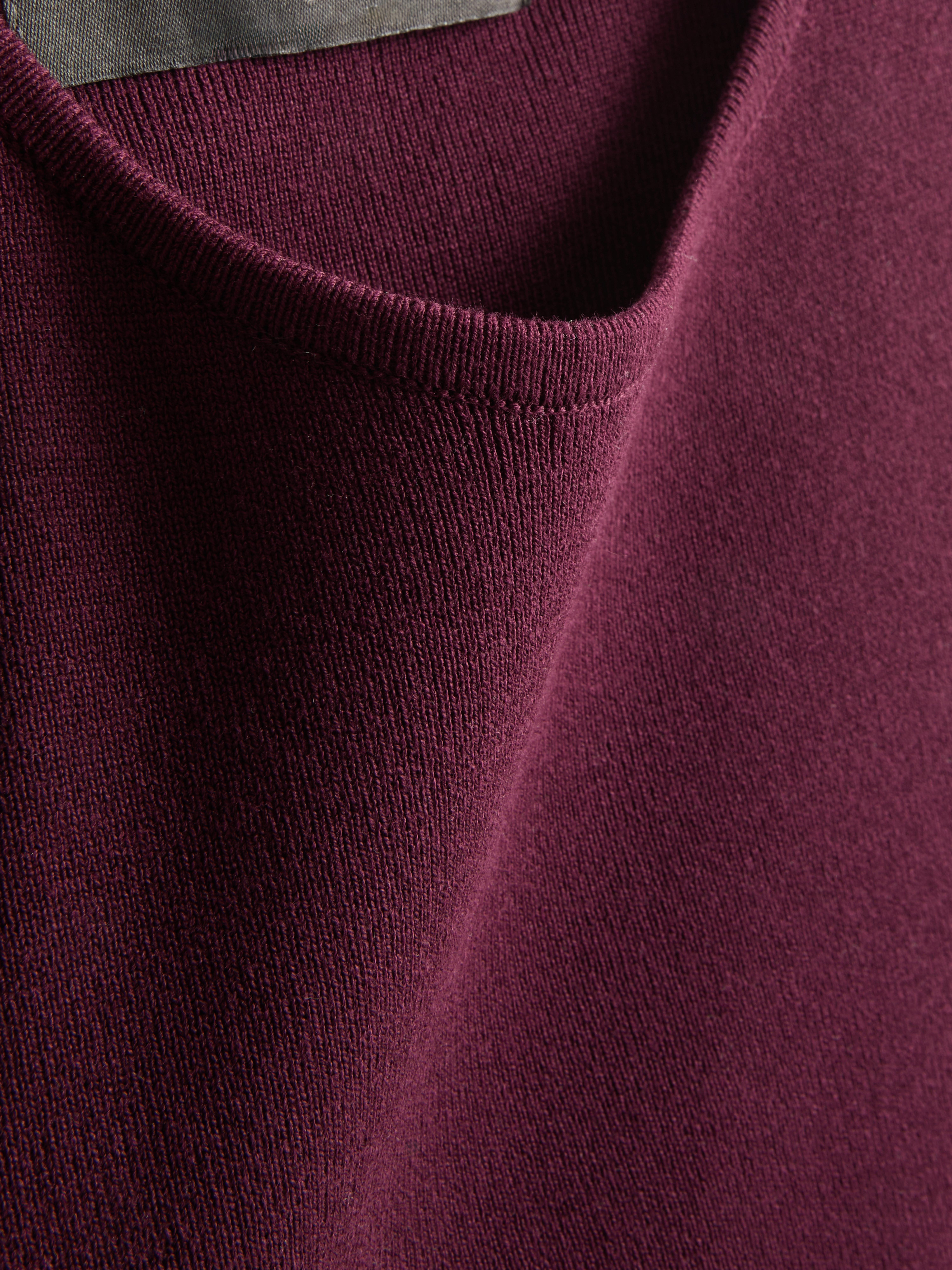 Dolga pletena majica brez rokavov