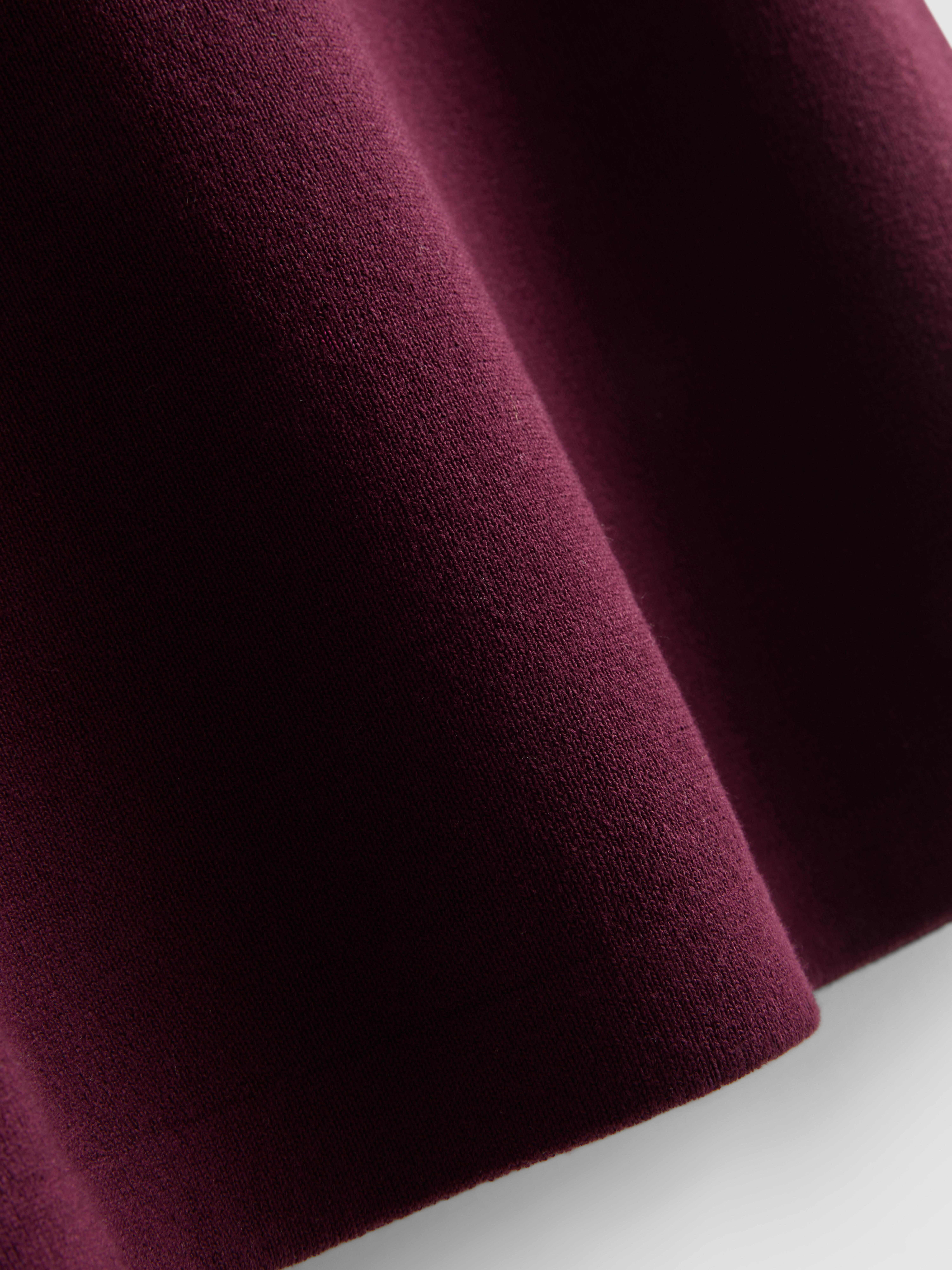 Dolga pletena majica brez rokavov