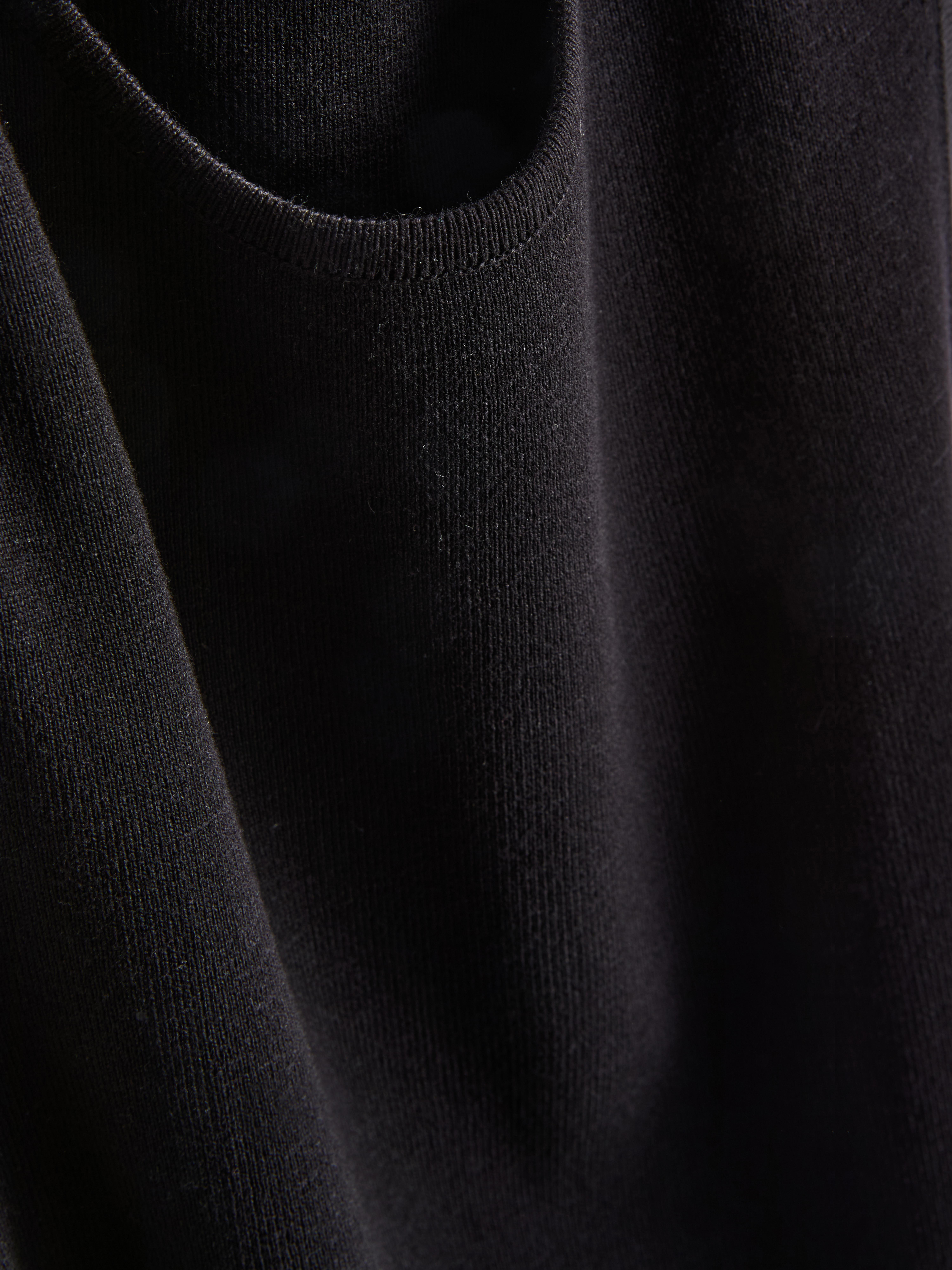 Hosszú, kötött mellény