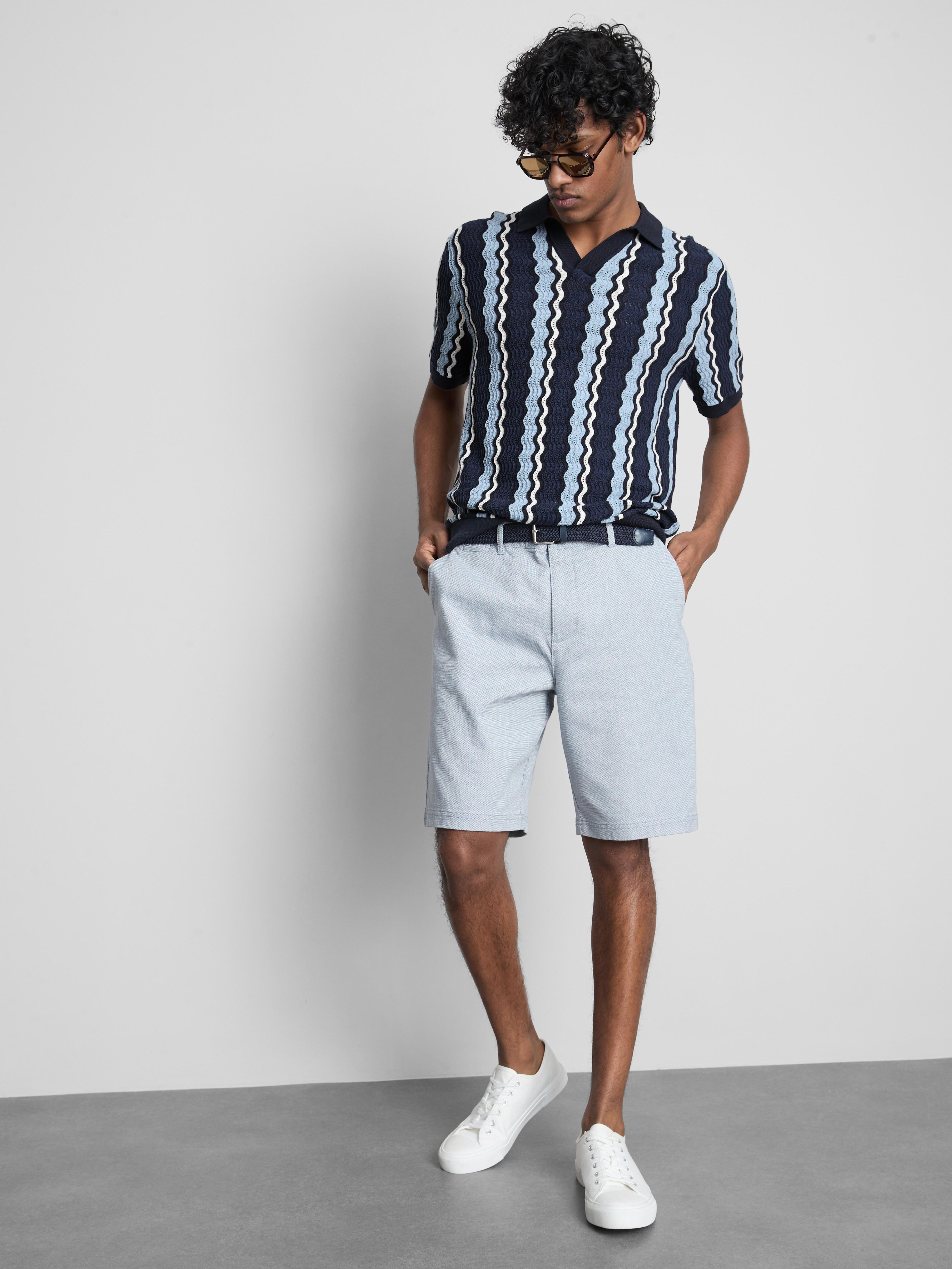 Polo en maille à rayures texturées