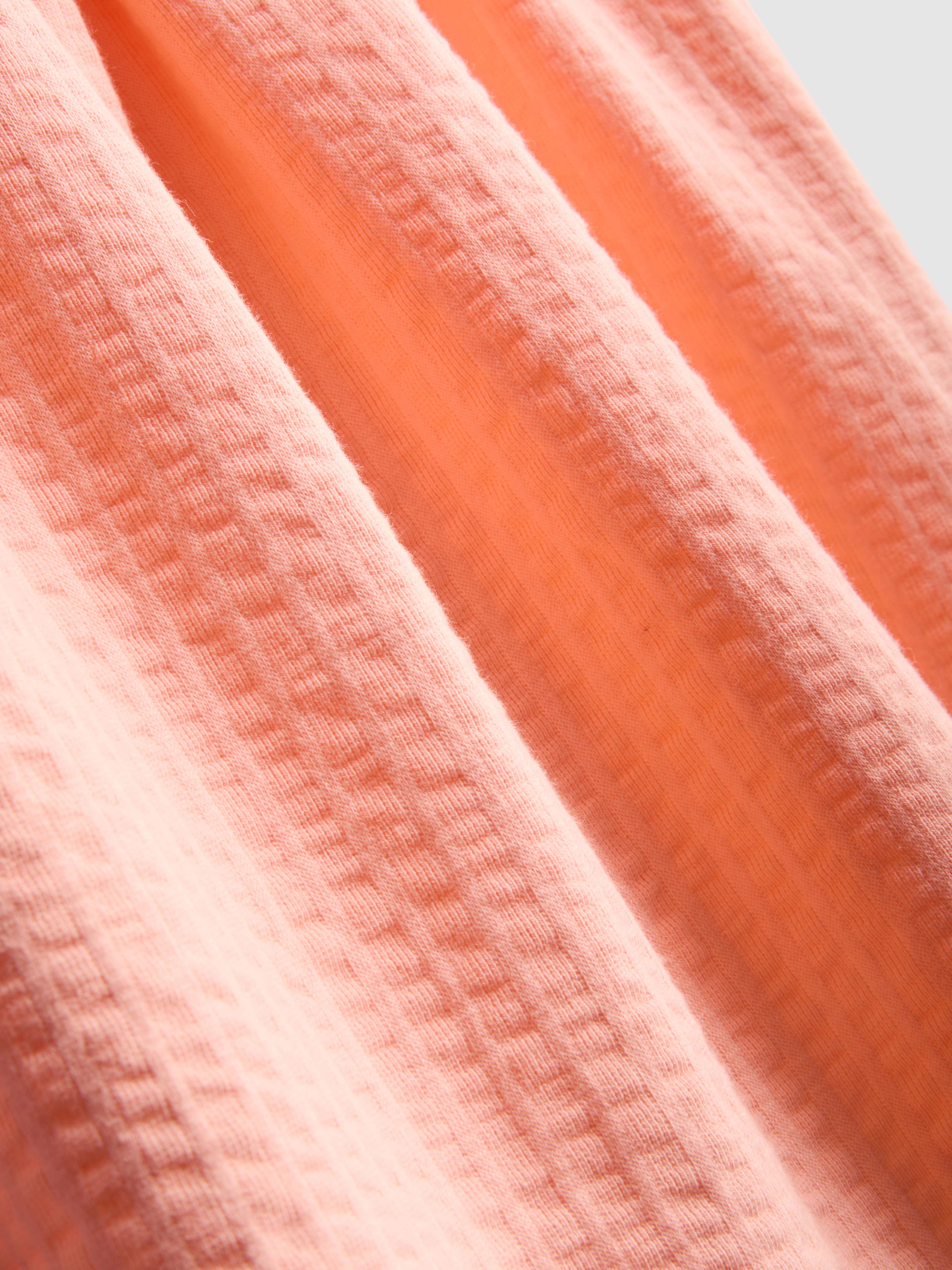 0-36 mnd | Jurk met textuur en strikdetail