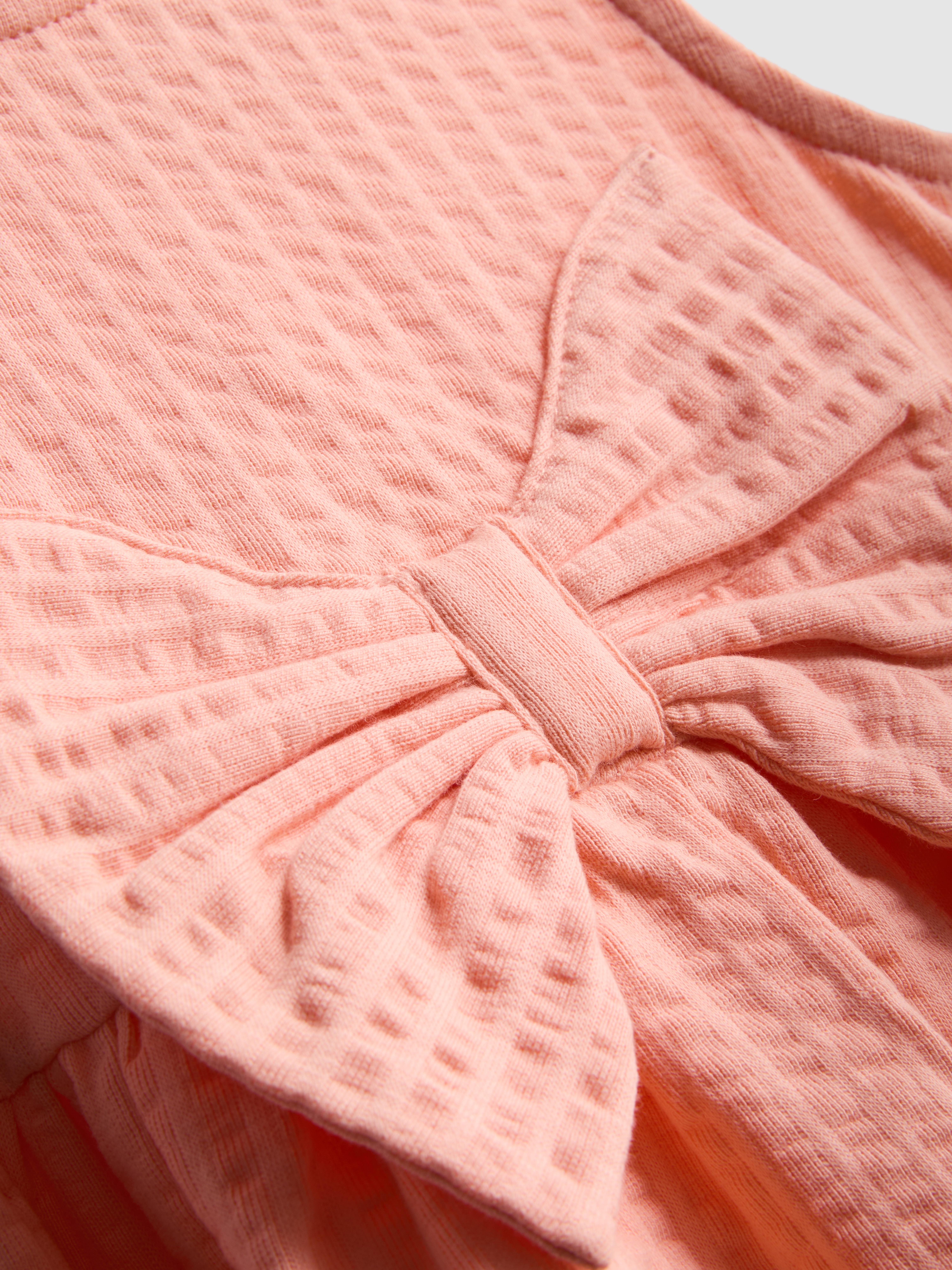 0-36 mnd | Jurk met textuur en strikdetail