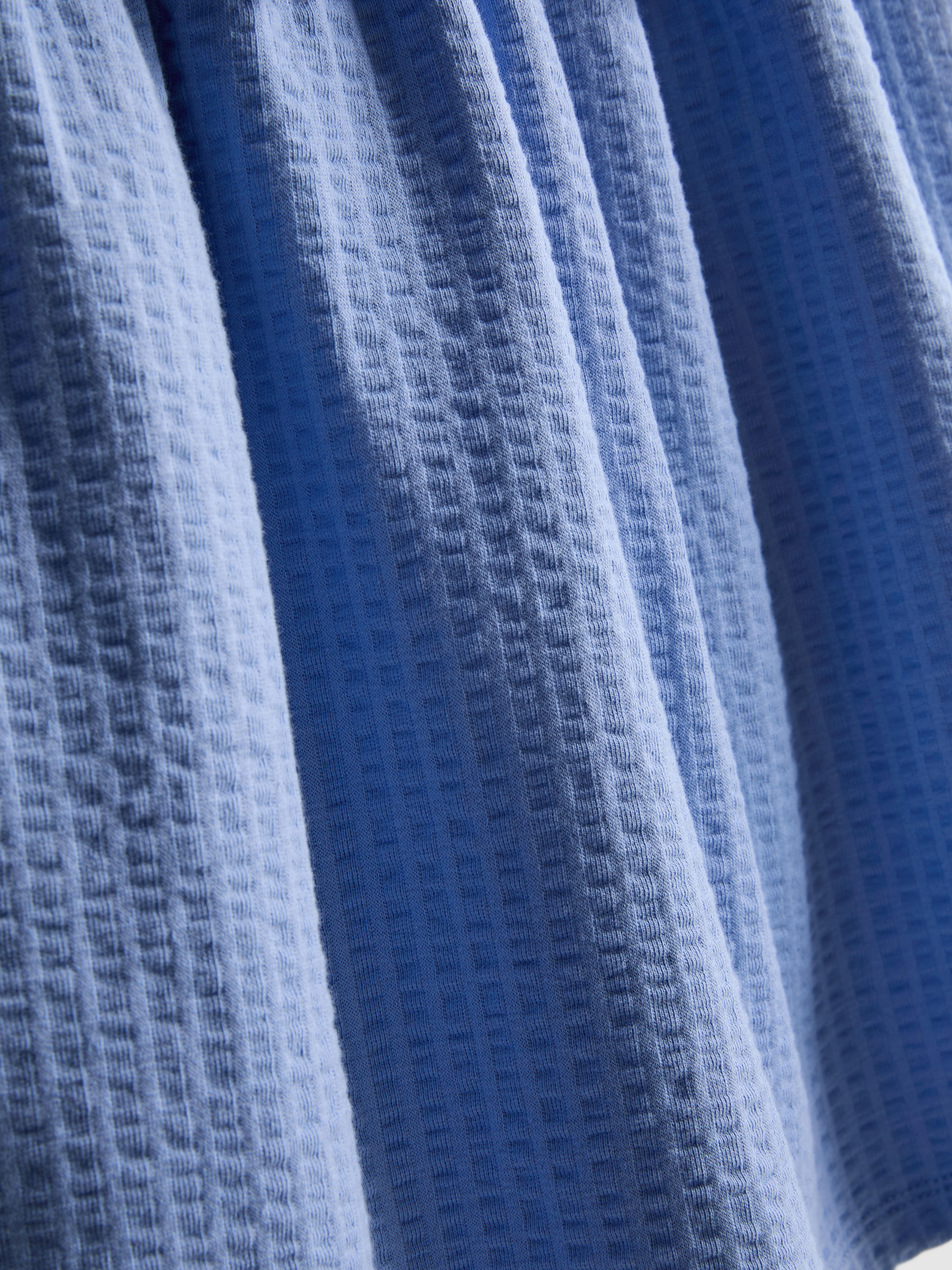 0-36 mnd | Jurk met textuur en strikdetail