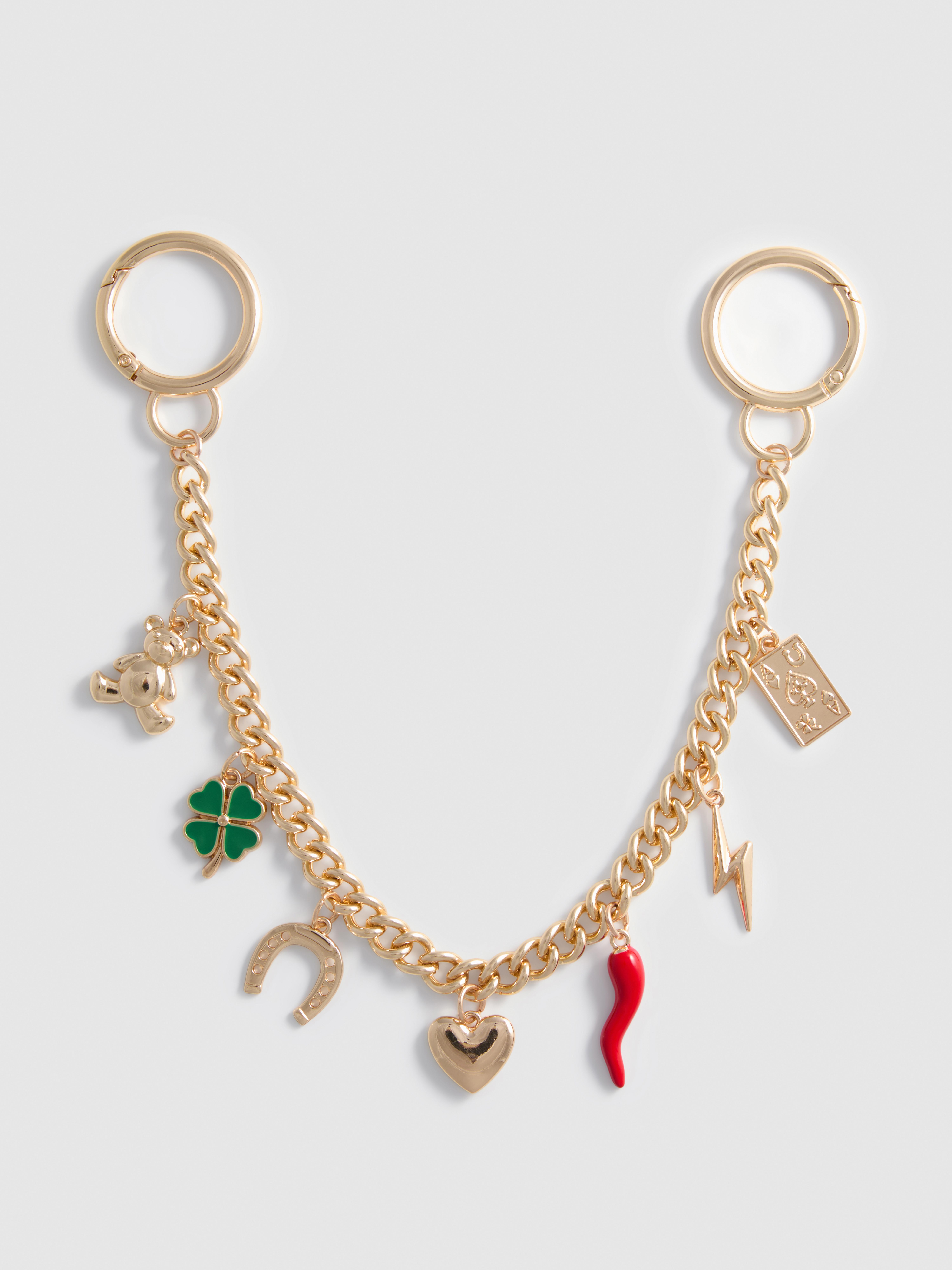 Tasketting met geluksbedeltjes