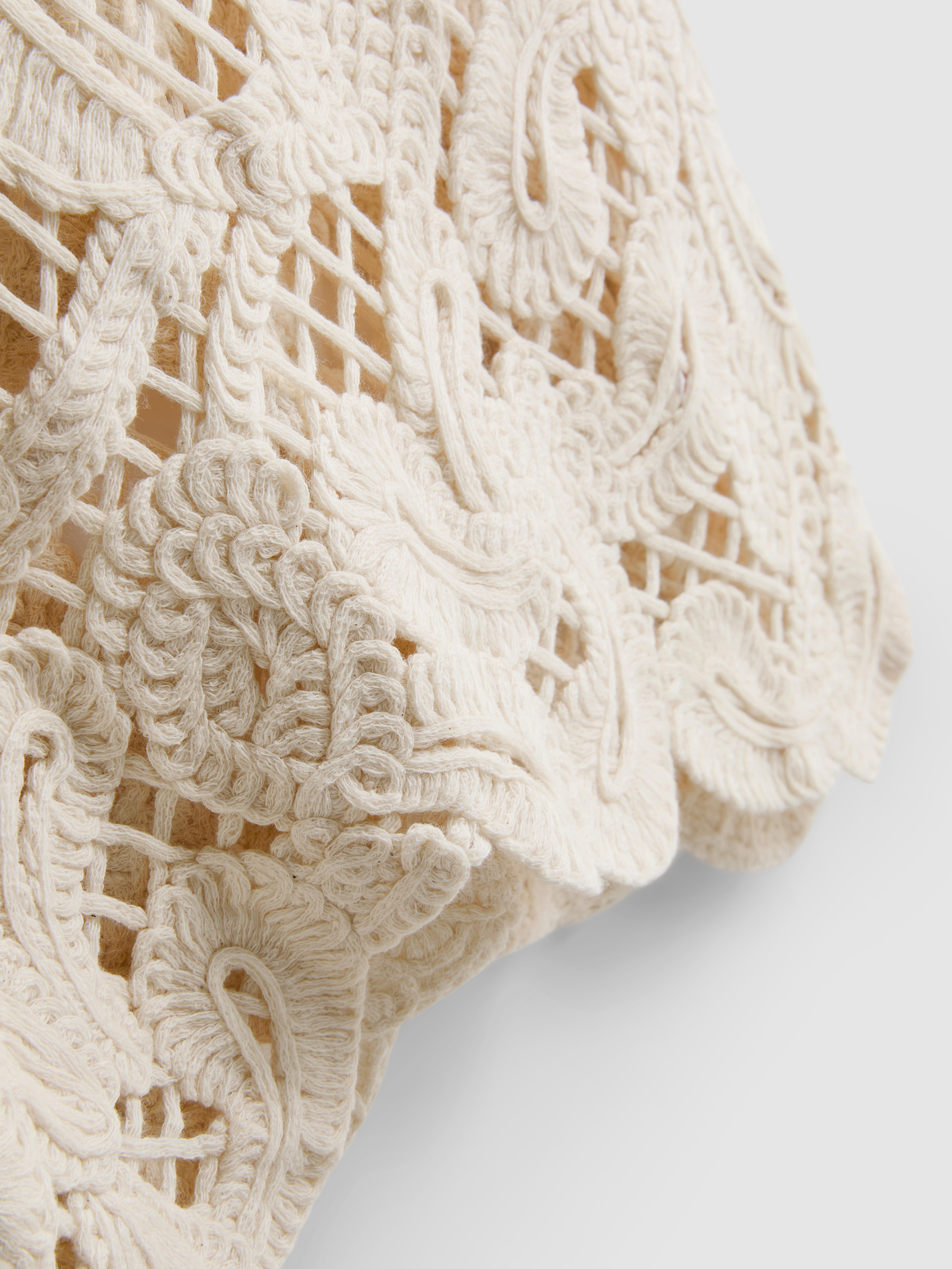 Débardeur asymétrique en maille crochet