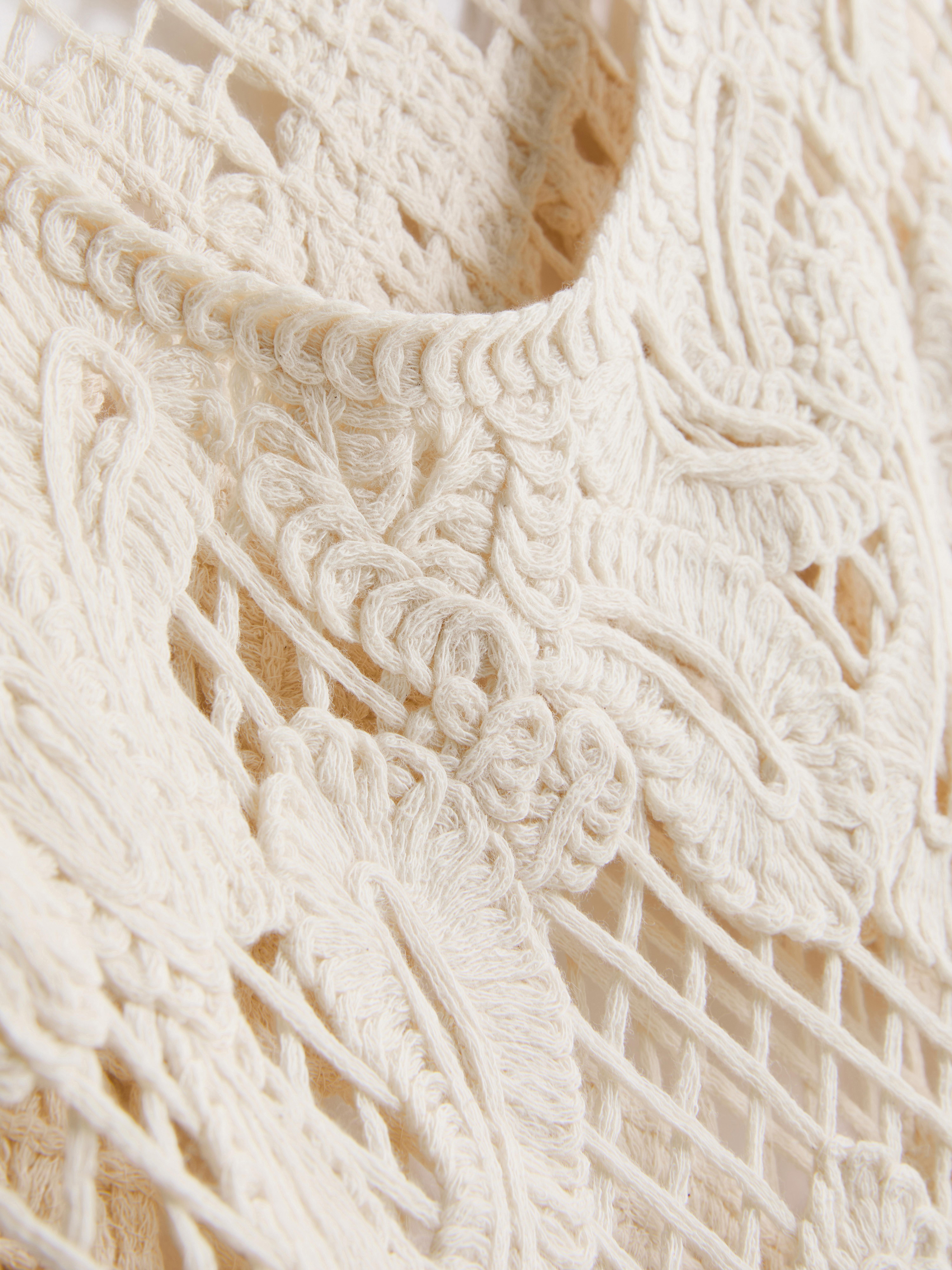 Débardeur asymétrique en maille crochet