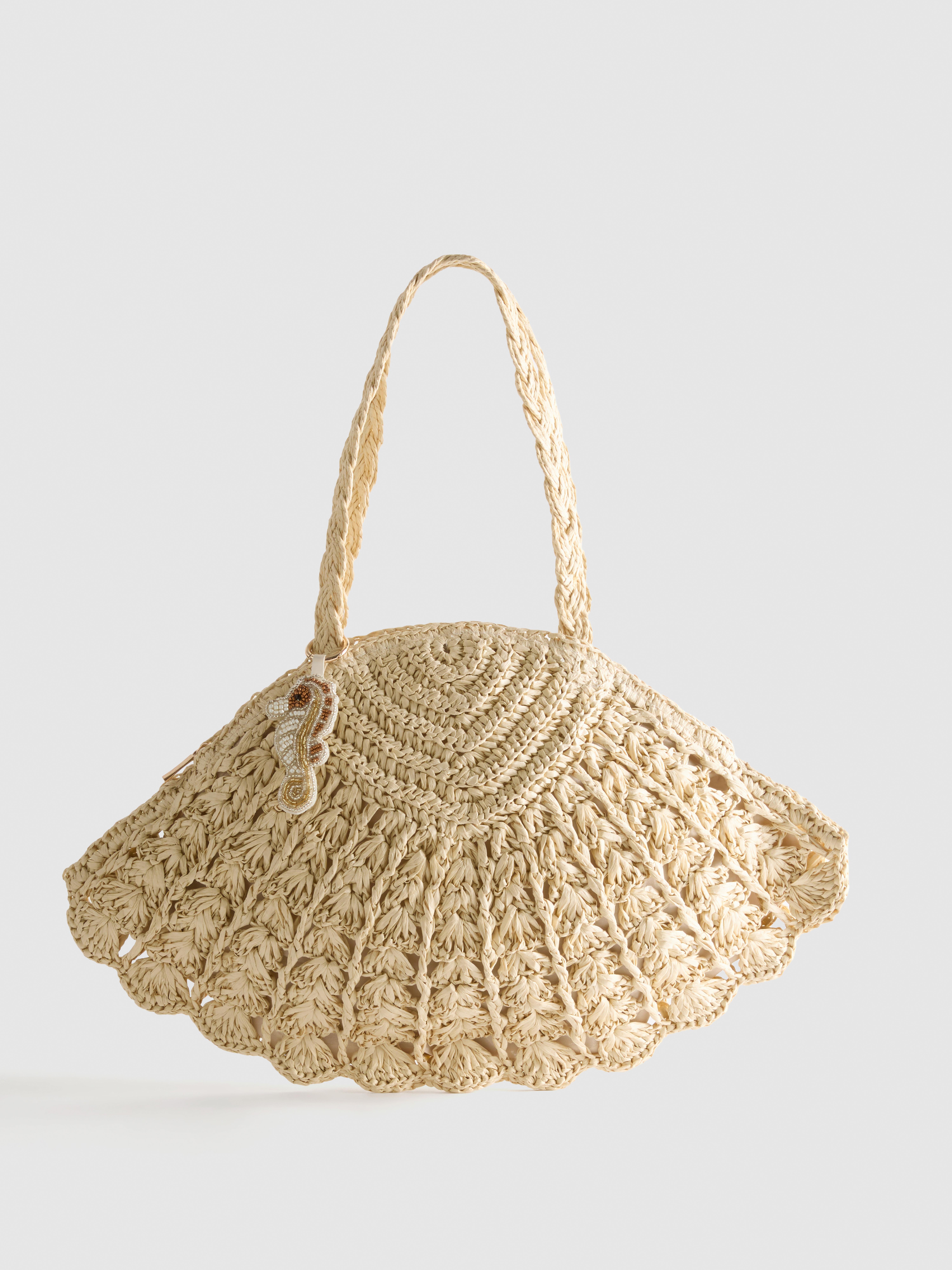 Borsa a spalla intrecciata a forma di conchiglia