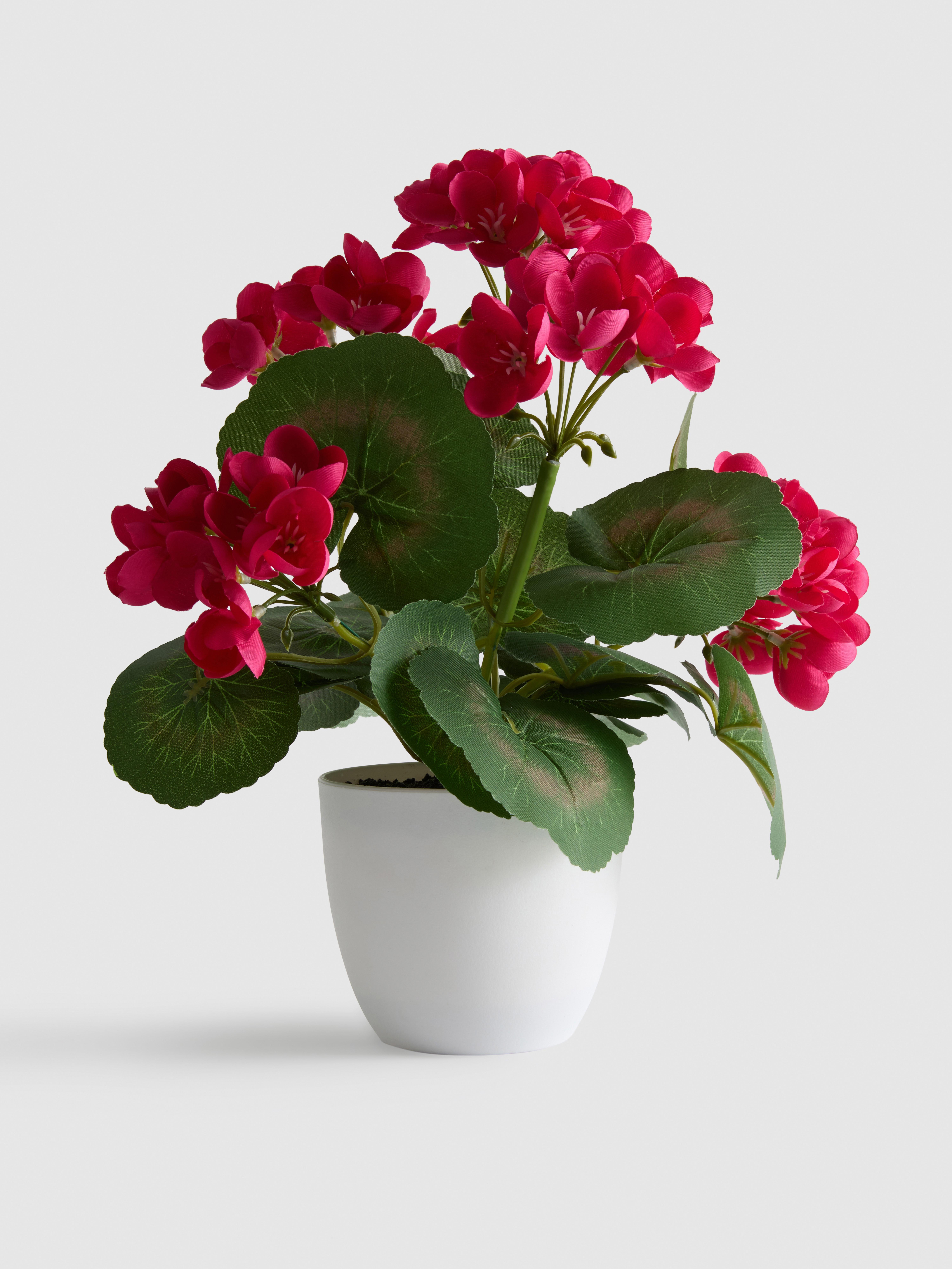 Composition de fleurs artificielles en pot