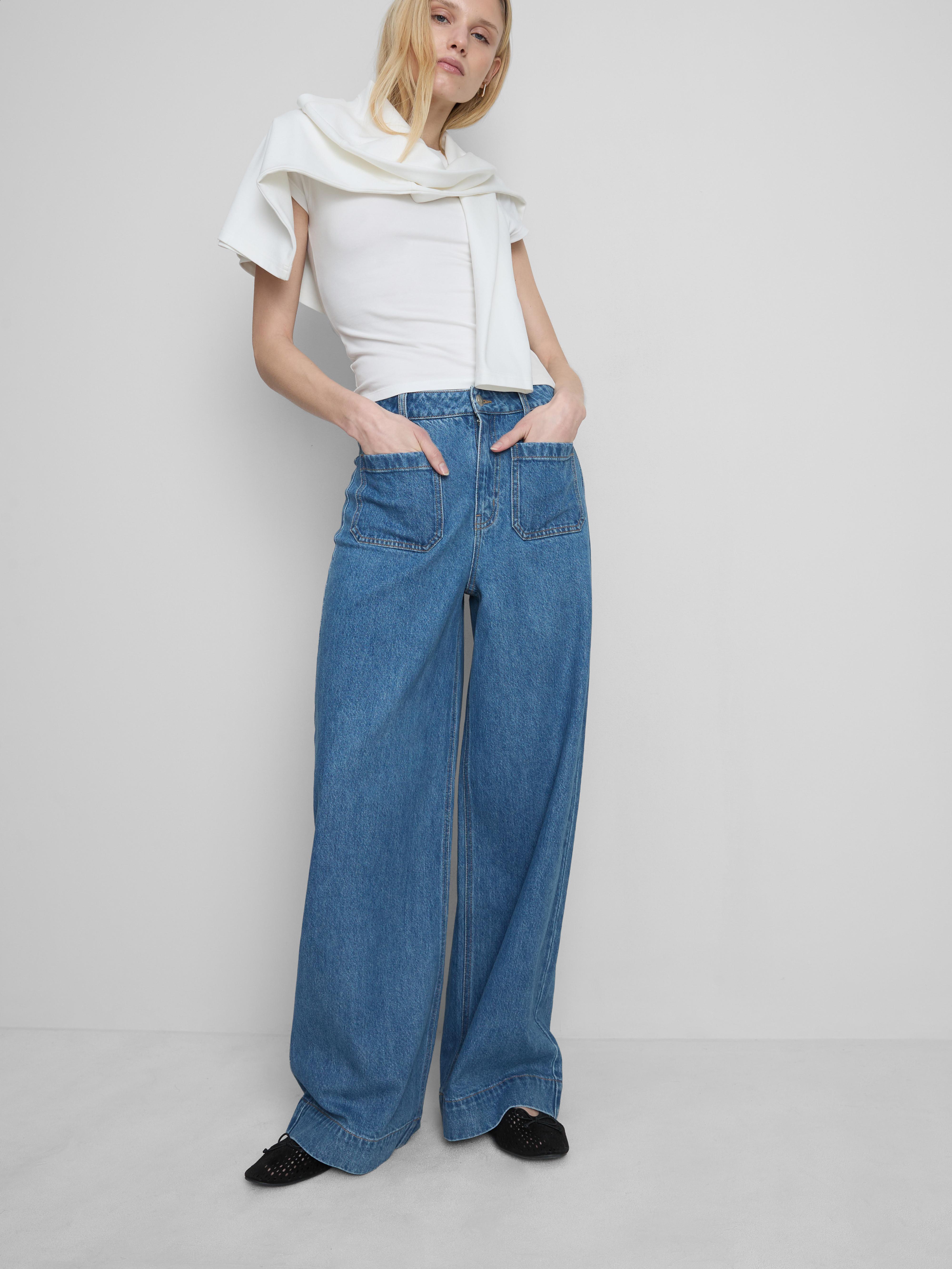 Széles szárú farmer az elején zsebbel