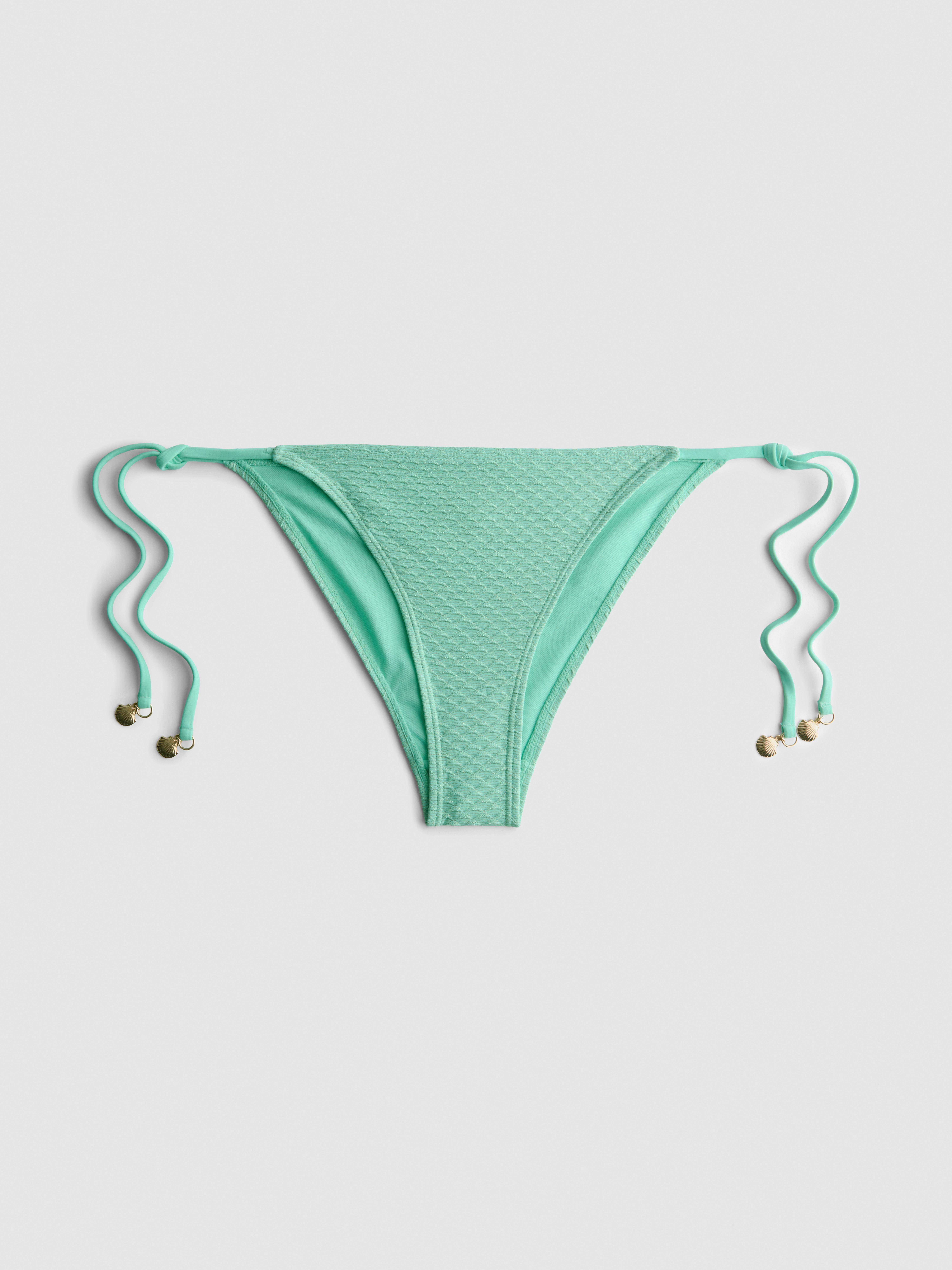 Bas de bikini texturé coquillage à nouer sur les côtés