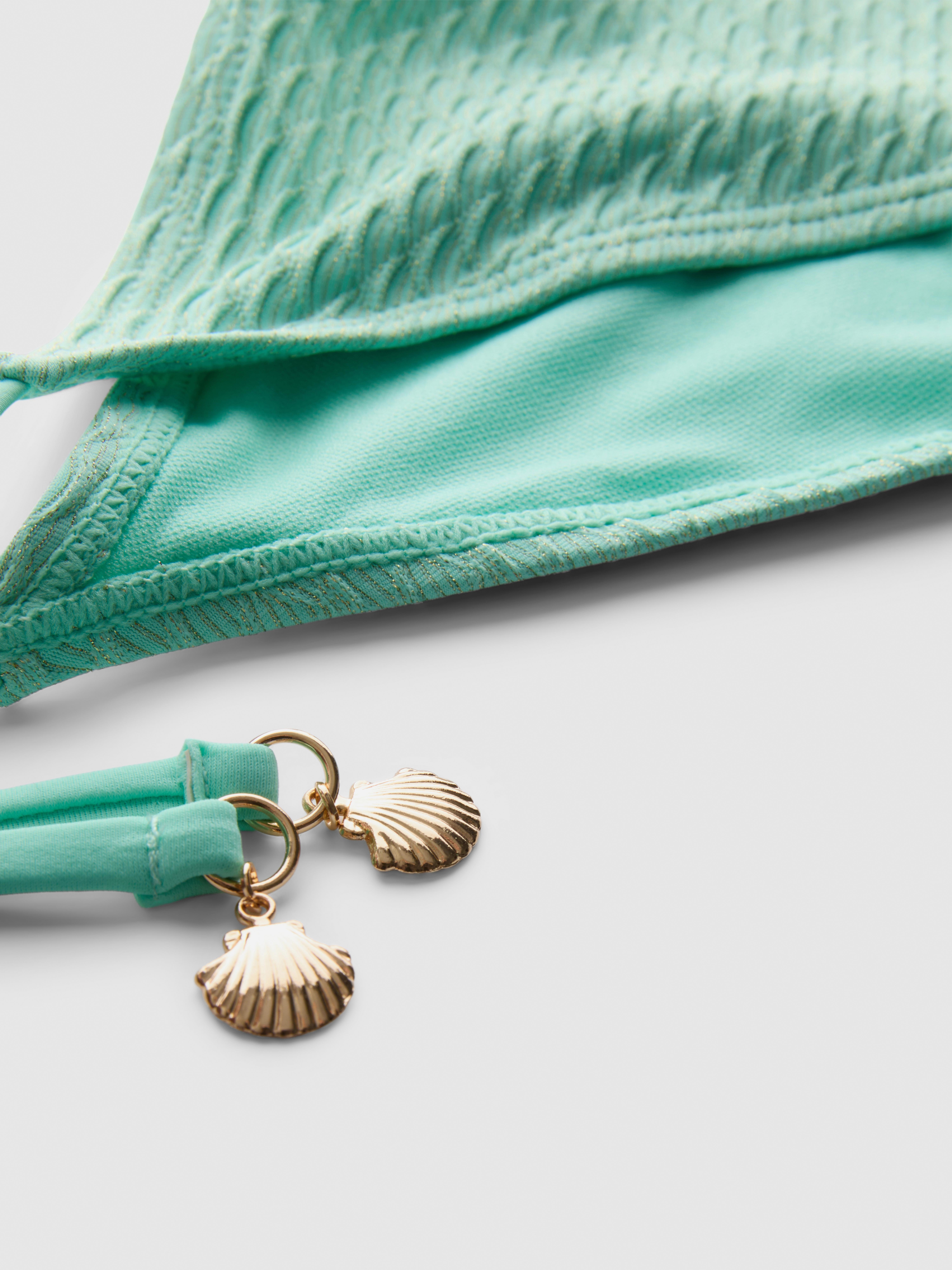Bas de bikini texturé coquillage à nouer sur les côtés