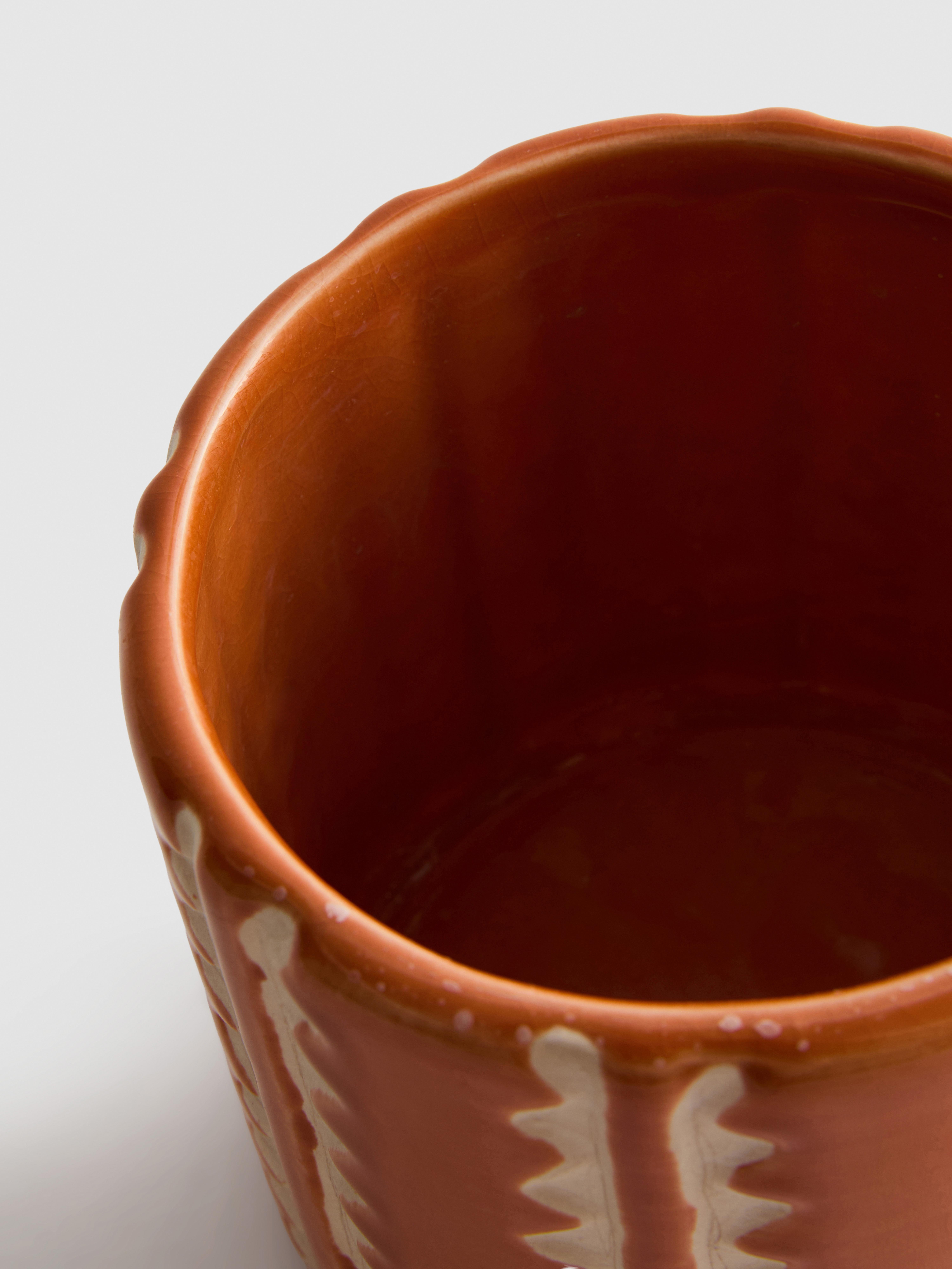 Kleine plantenpot met geometrische motieven