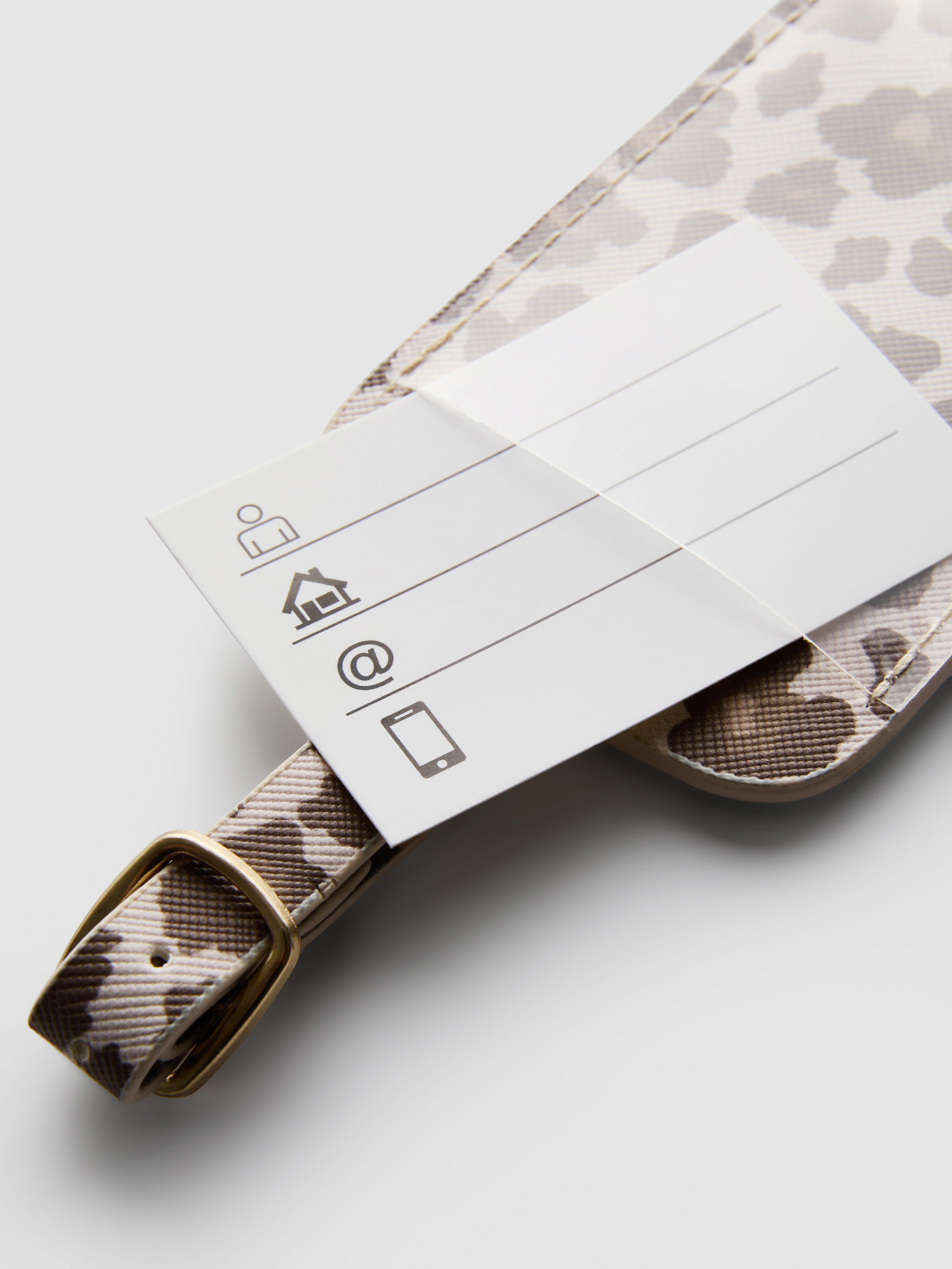 Etichetta per bagagli con stampa leopardata