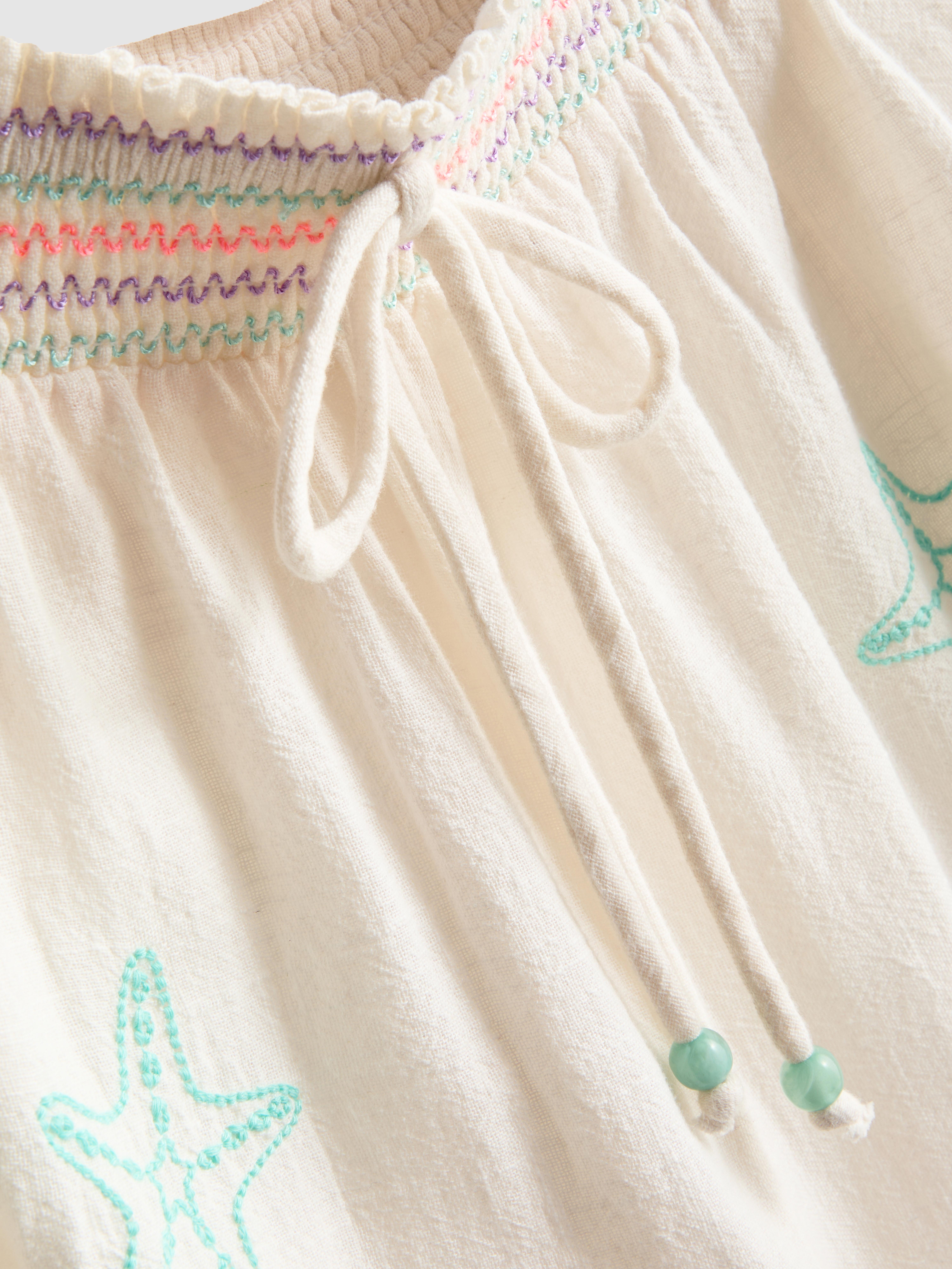Pantaloni da spiaggia larghi in cotone con ricami