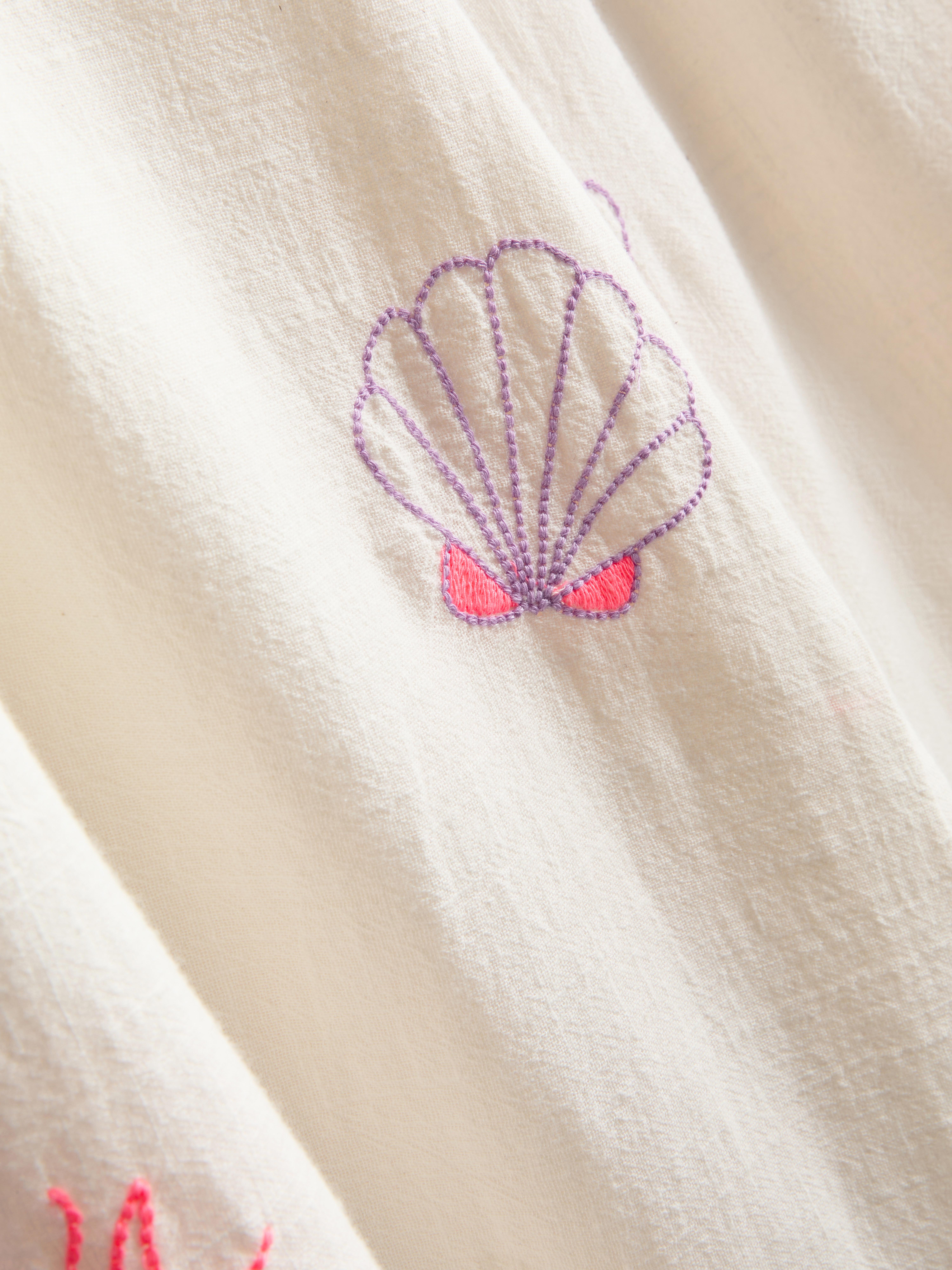 Pantaloni da spiaggia larghi in cotone con ricami