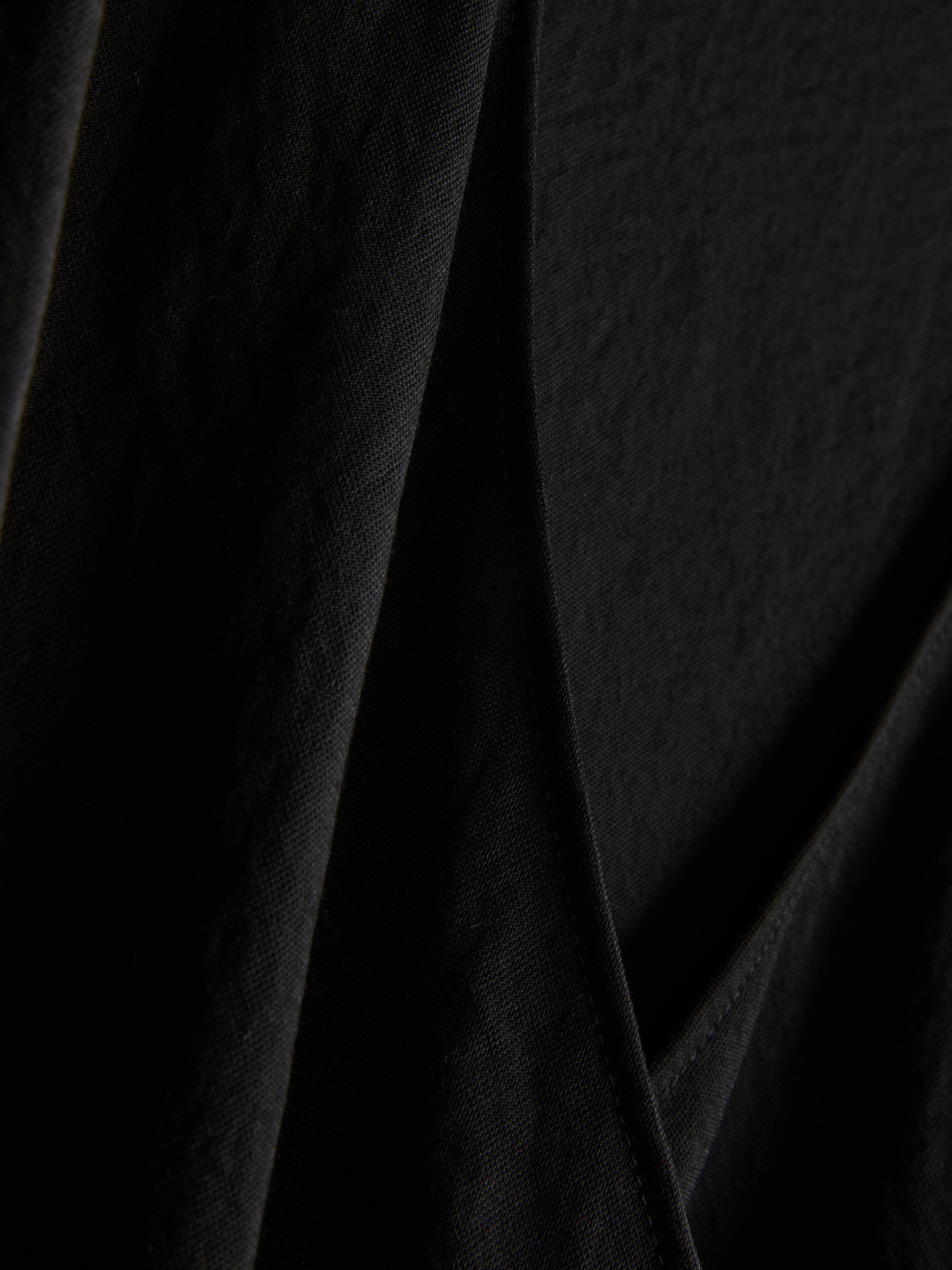 Maglia a portafoglio con laccetti