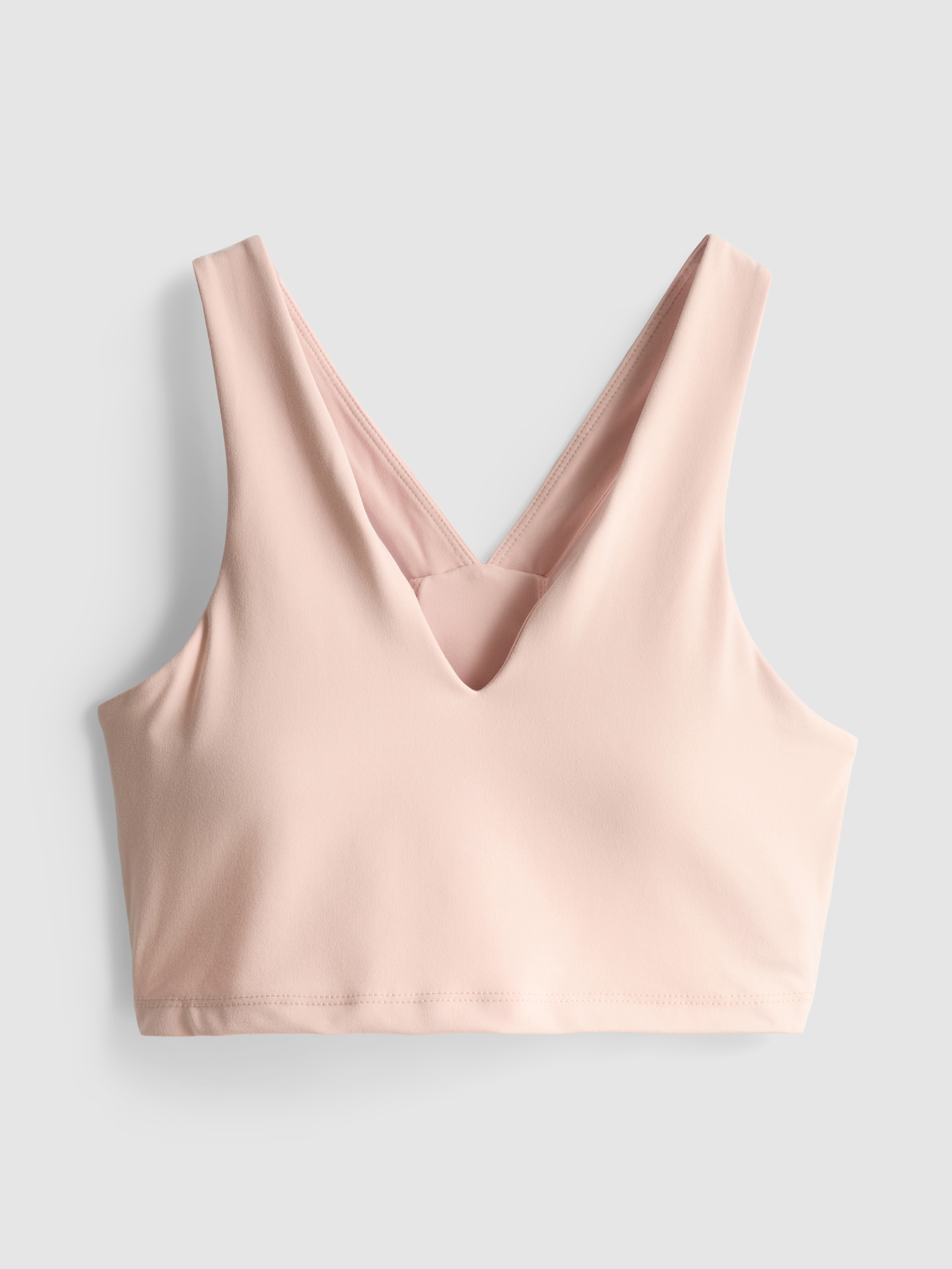 Top sportivo corto con scollo a V