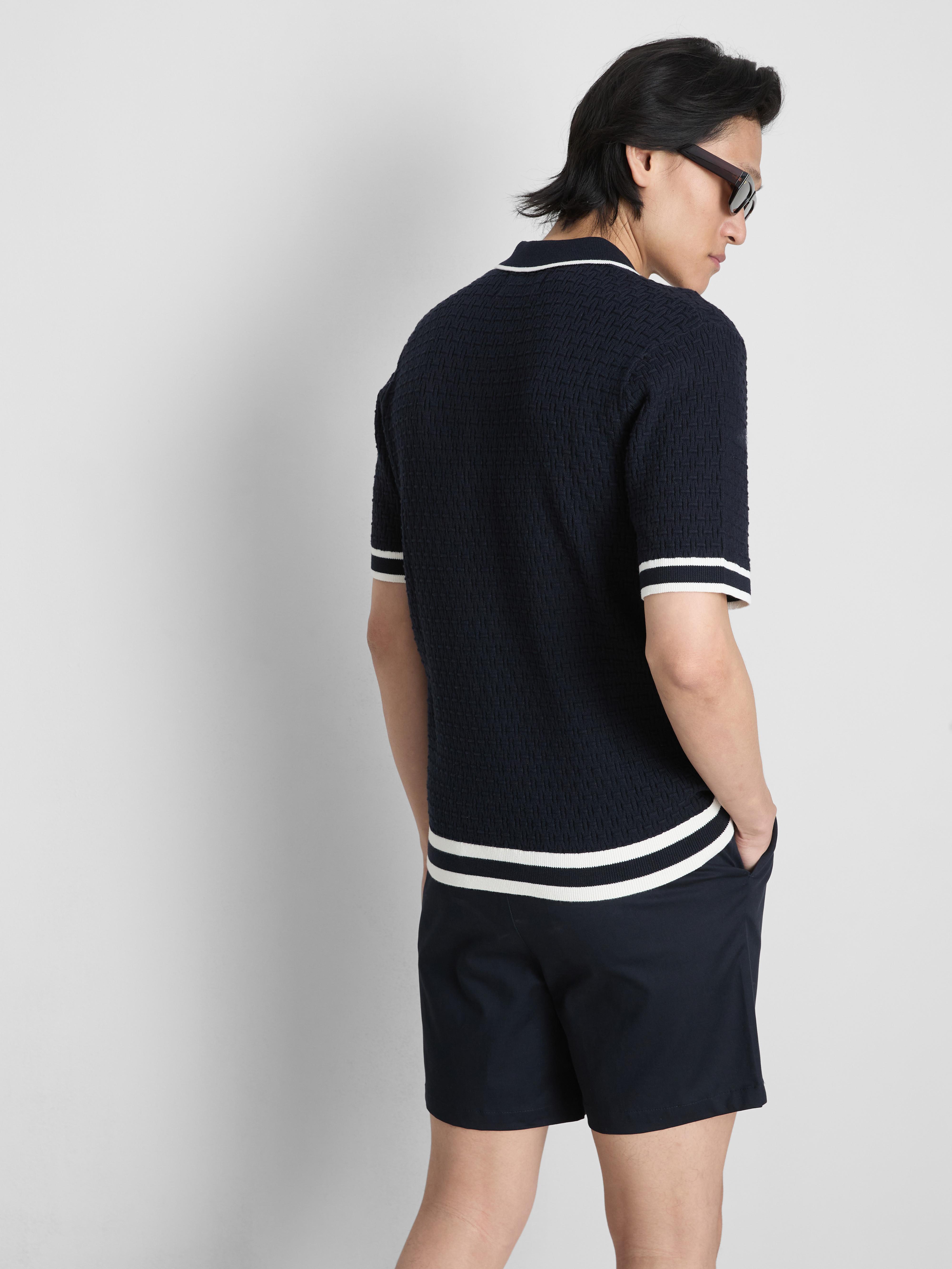 Polo texturé zippé The Edit