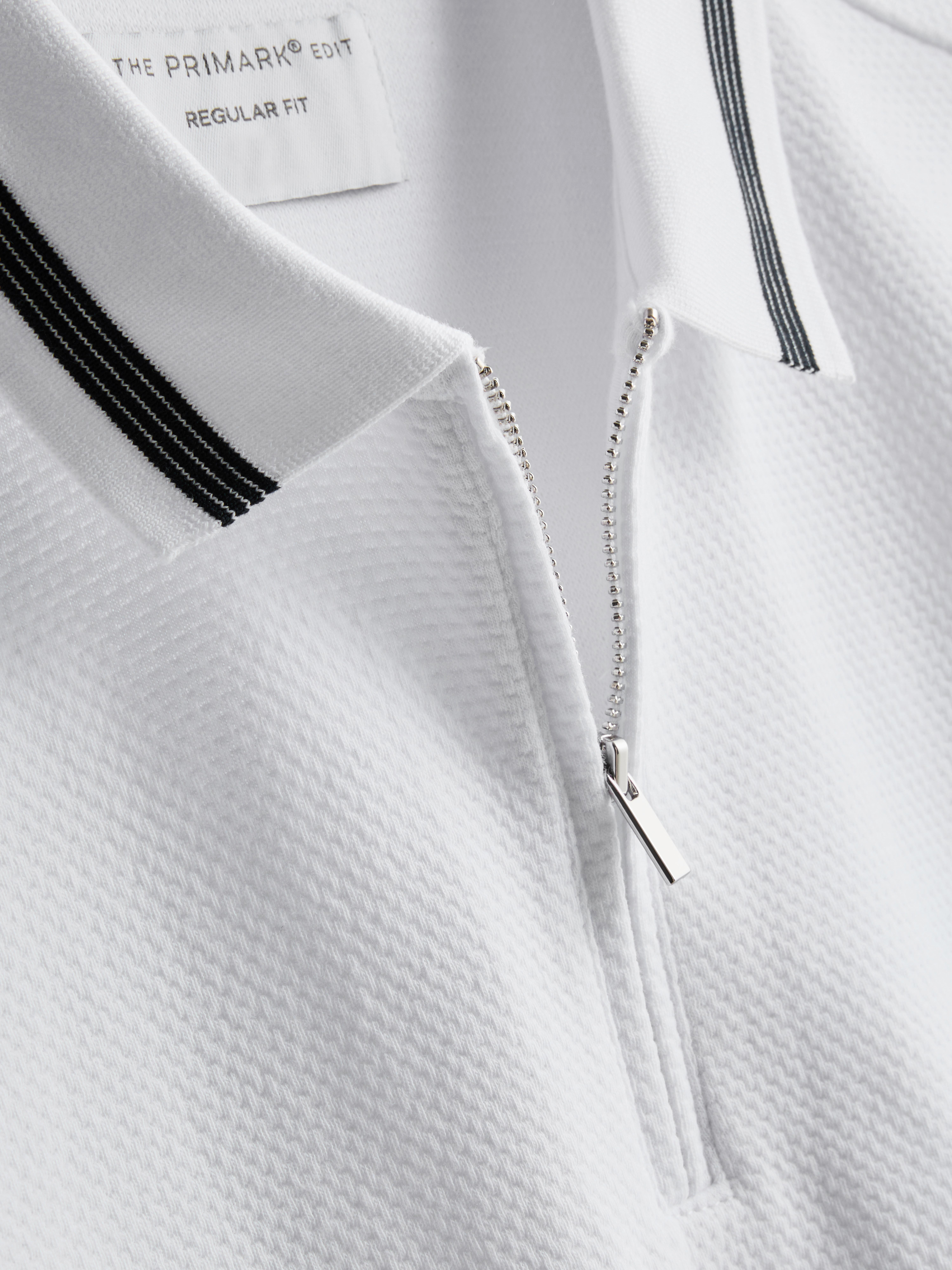 Poloshirt met textuur en rits