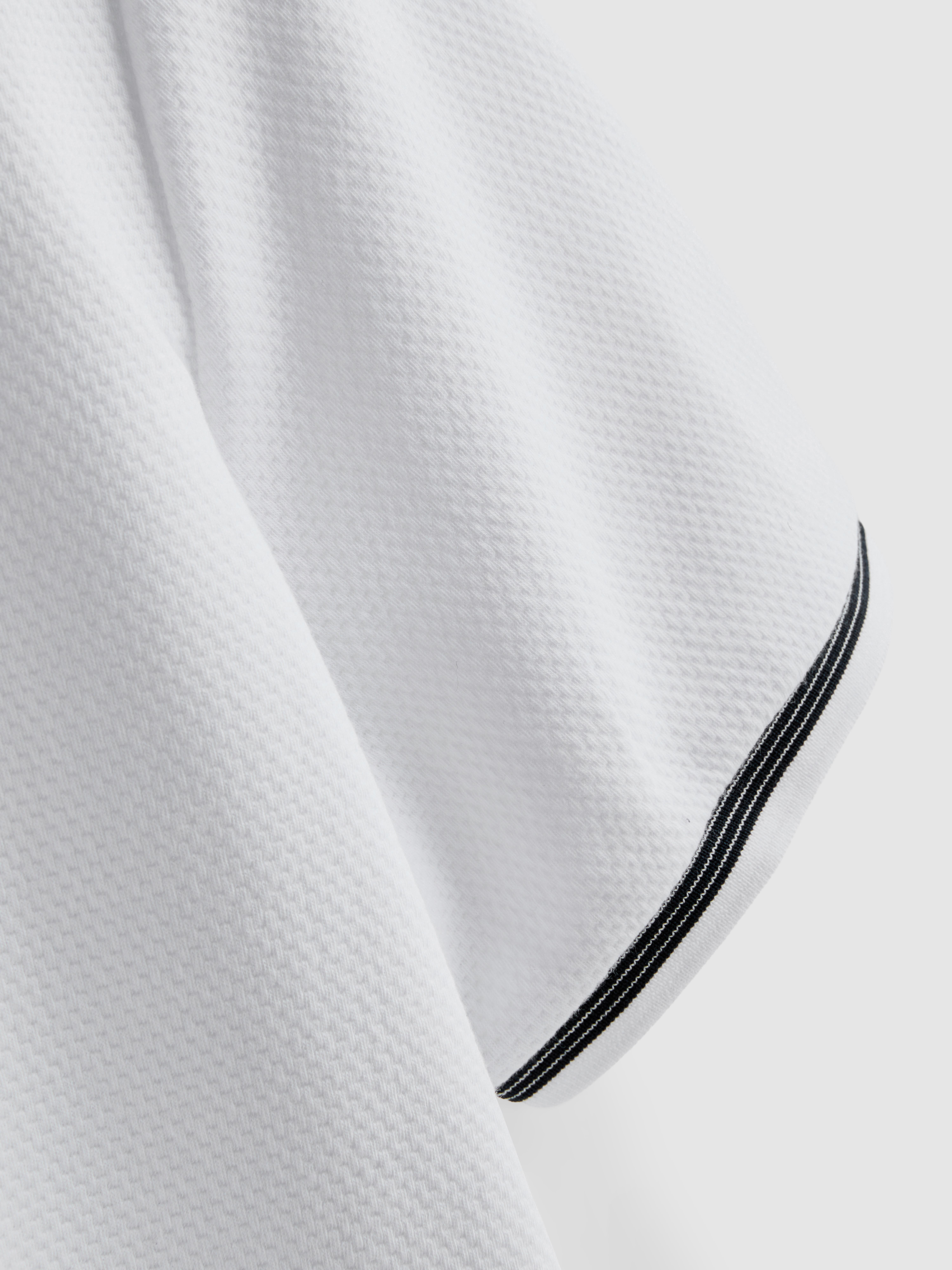 Poloshirt met textuur en rits