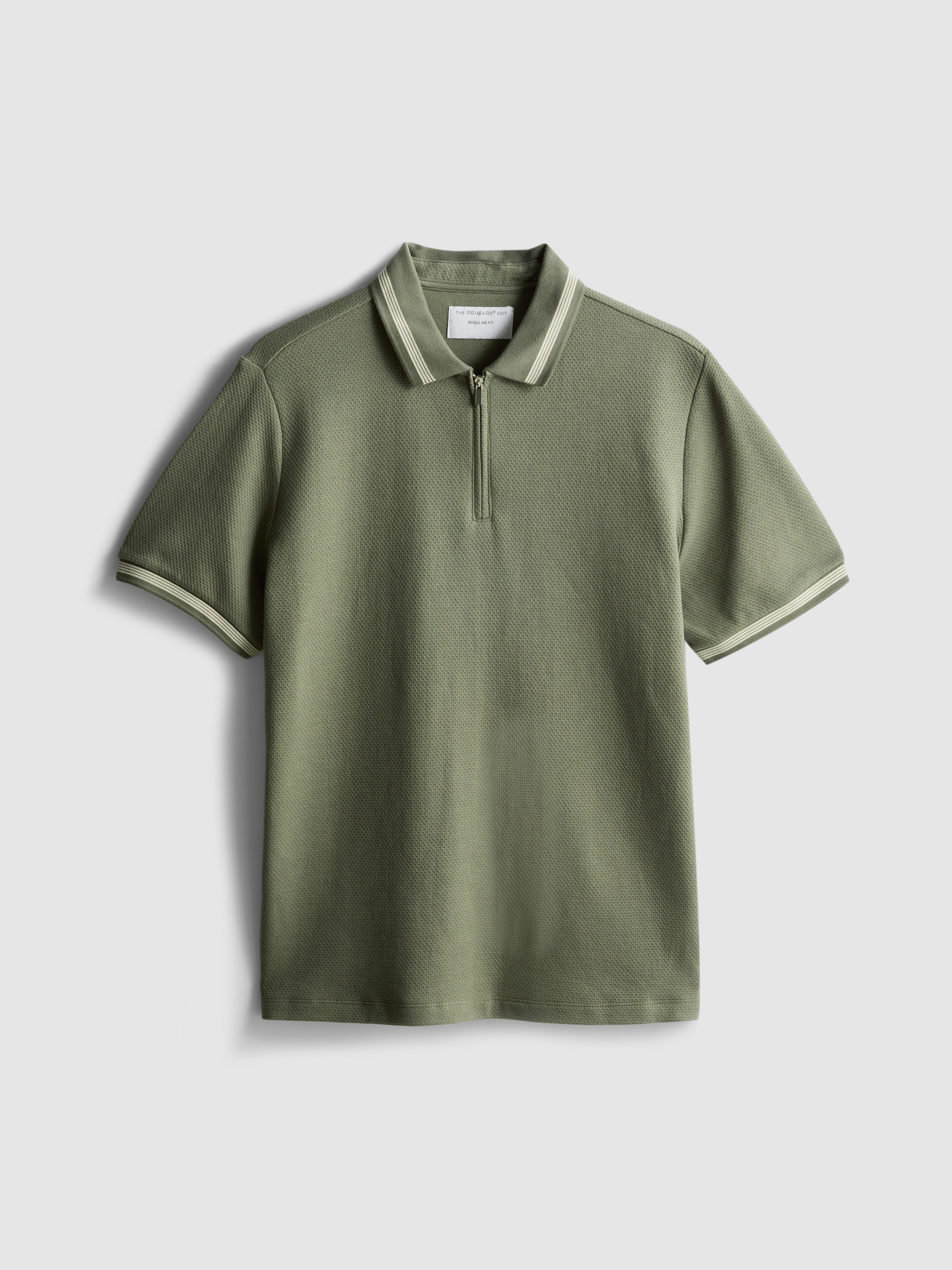 Polo strutturata con zip sul colletto