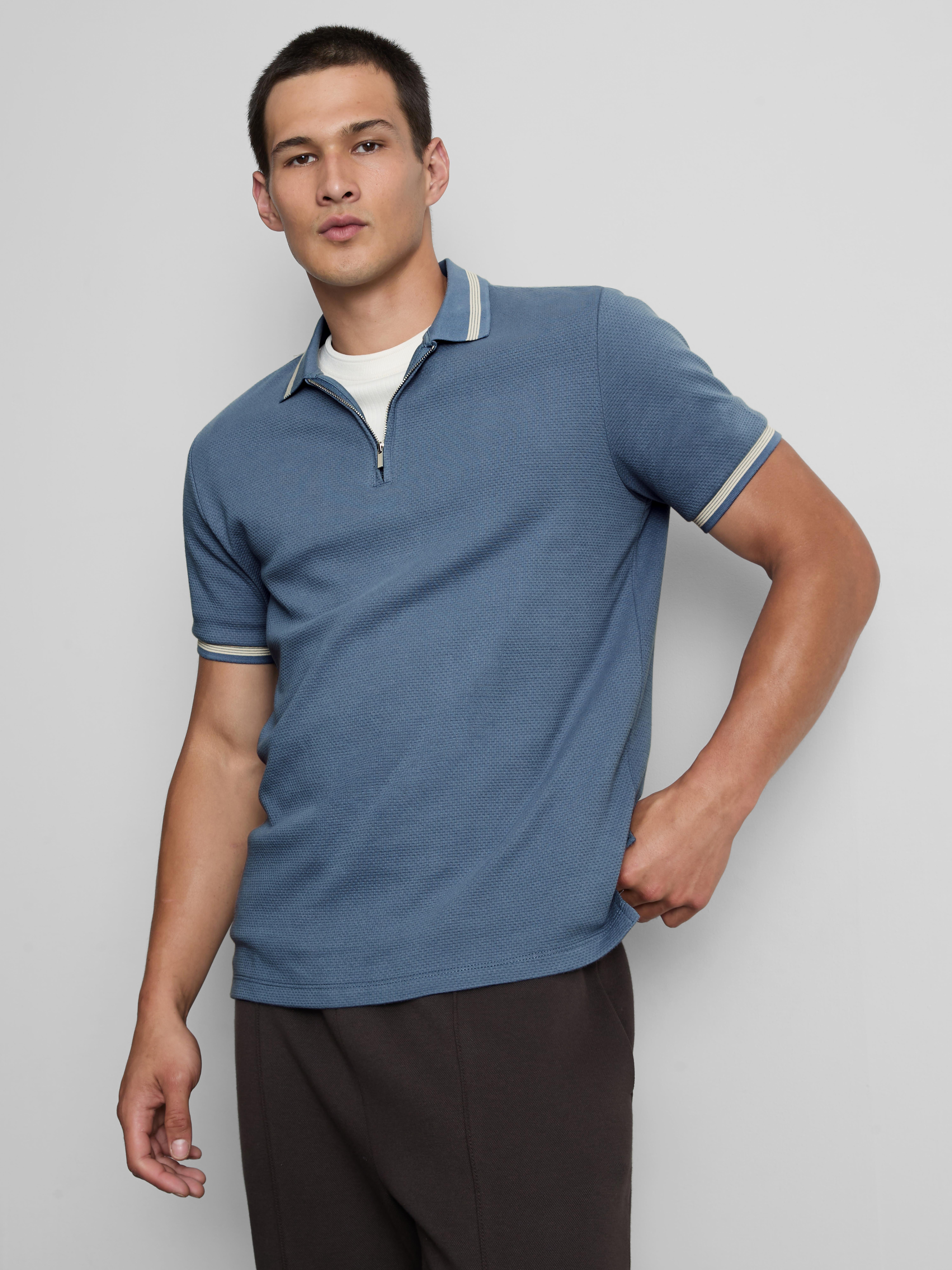 Polo texturé à col zippé