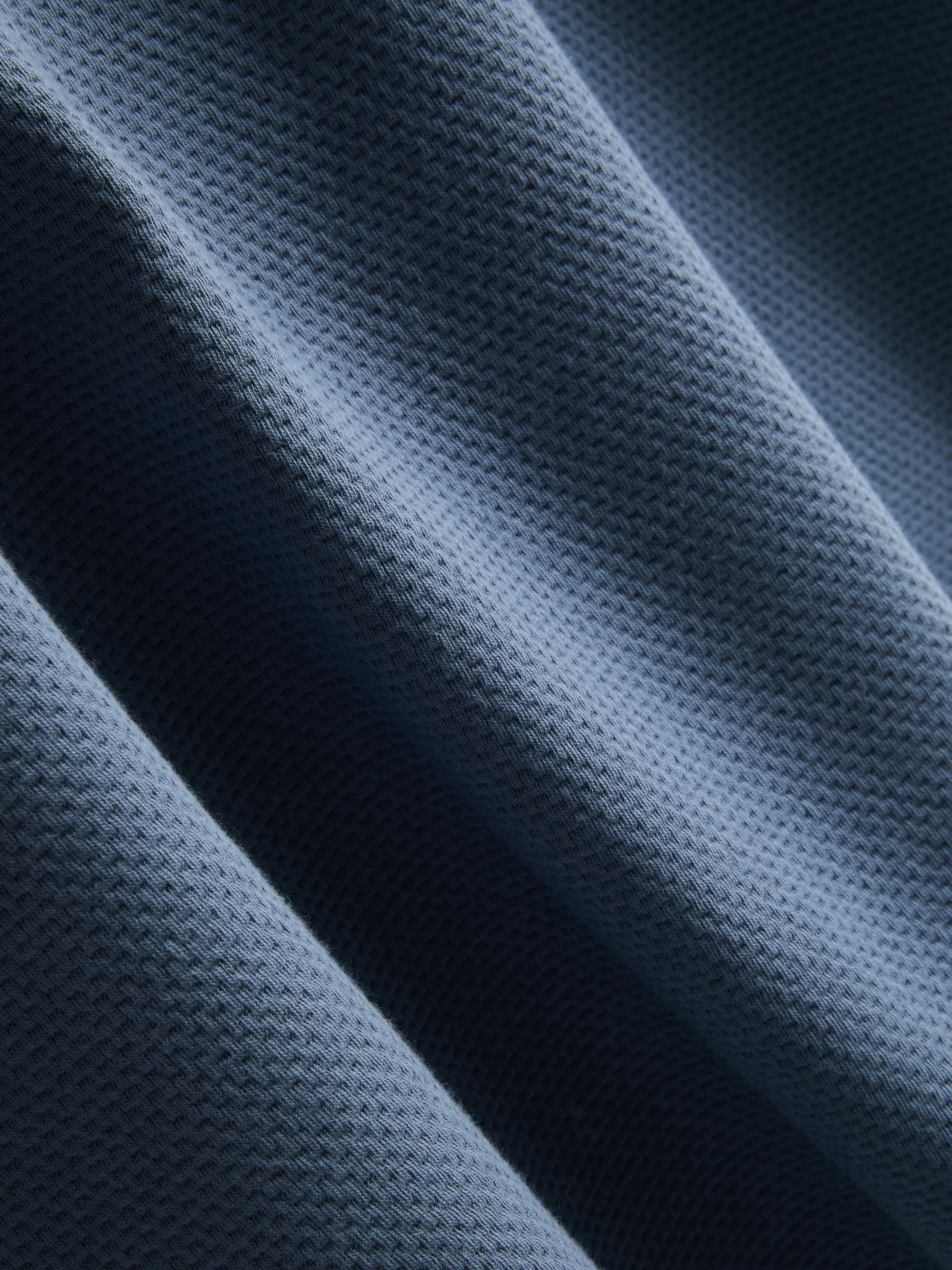 Poloshirt met textuur en rits