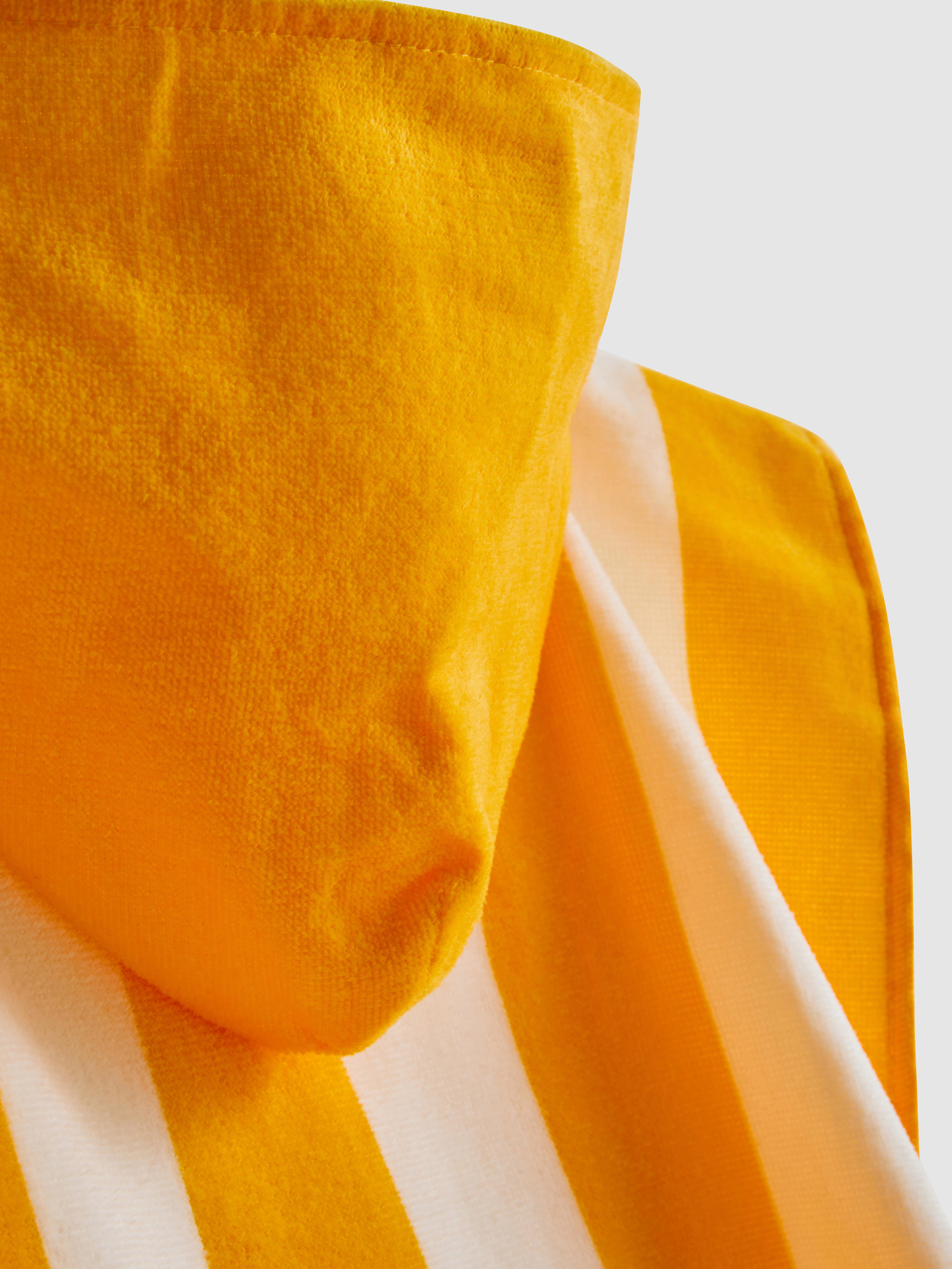 Poncho à capuche en tissu-éponge