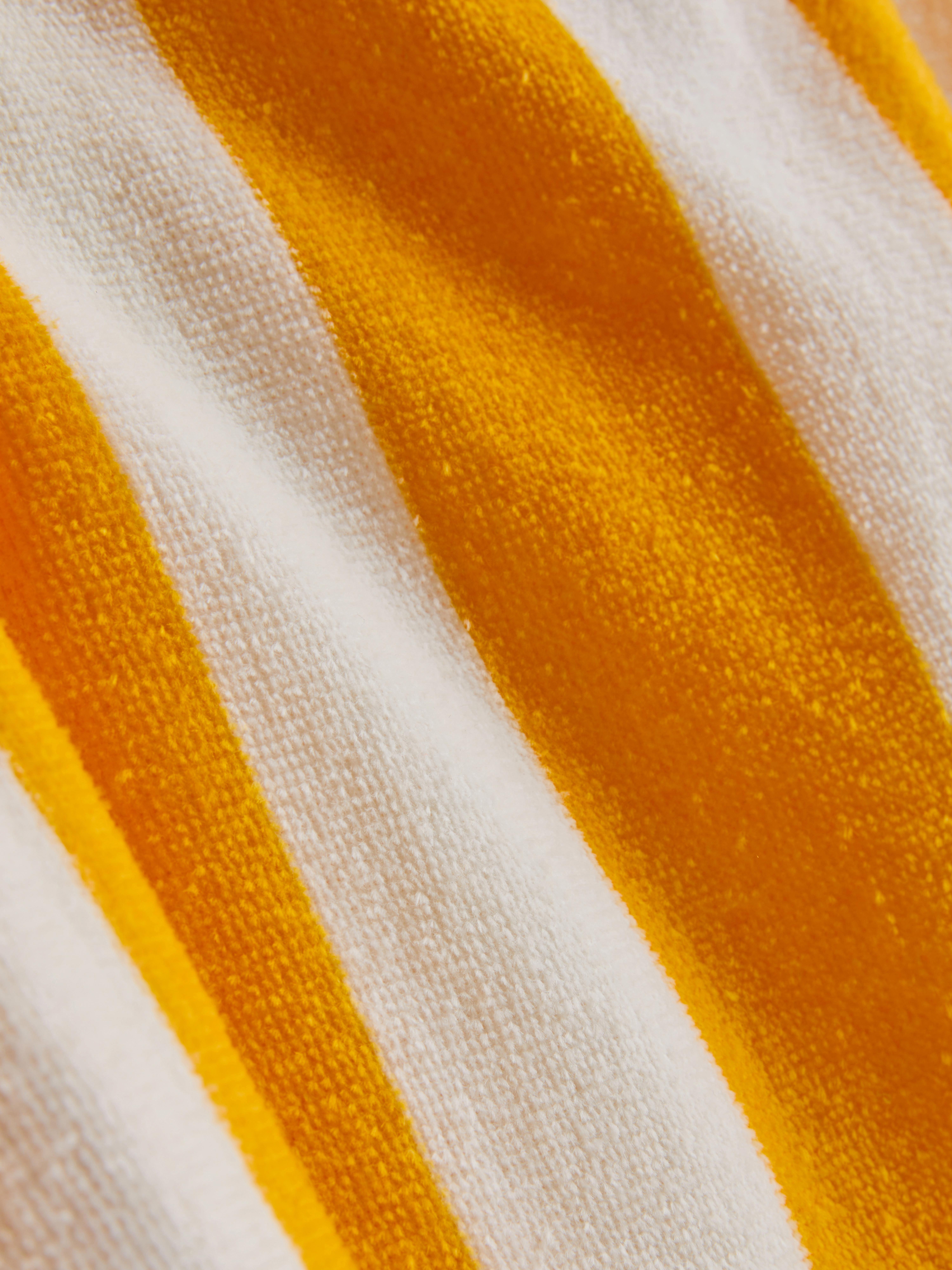 Poncho à capuche en tissu-éponge