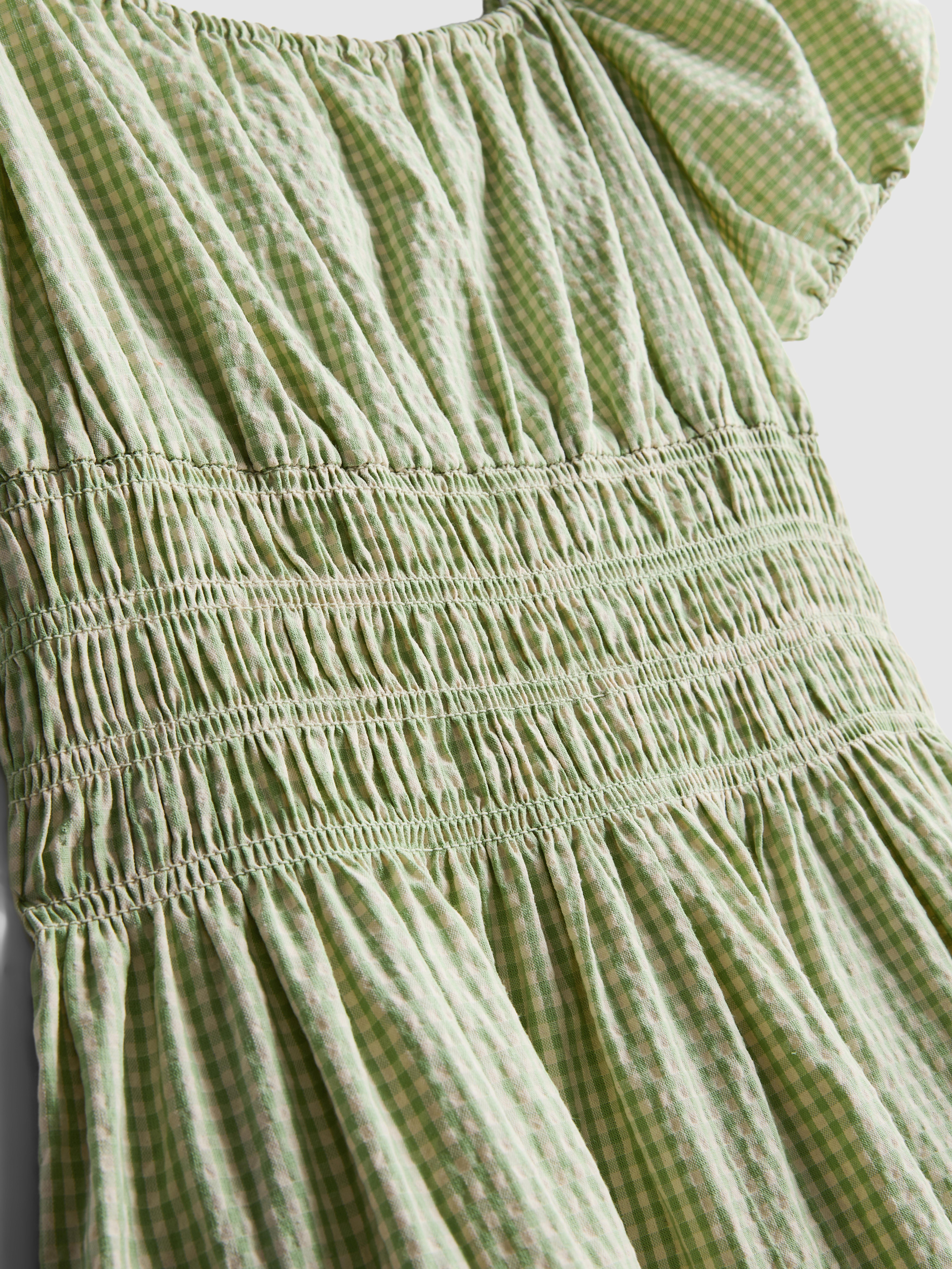 Vestido midi de cuadros a capas de Stacey Solomon