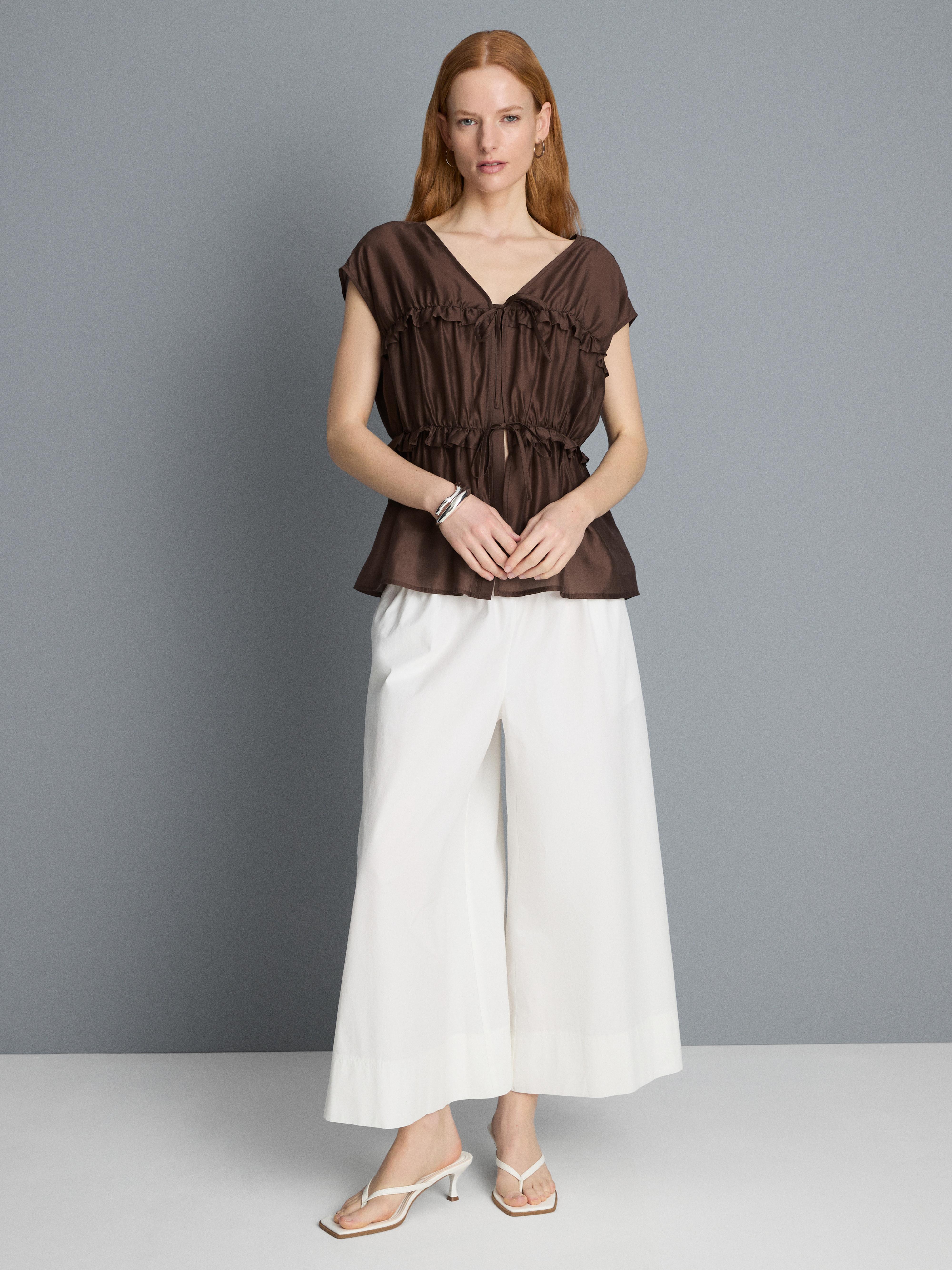 Sleeveless Shirred V-Neck Top