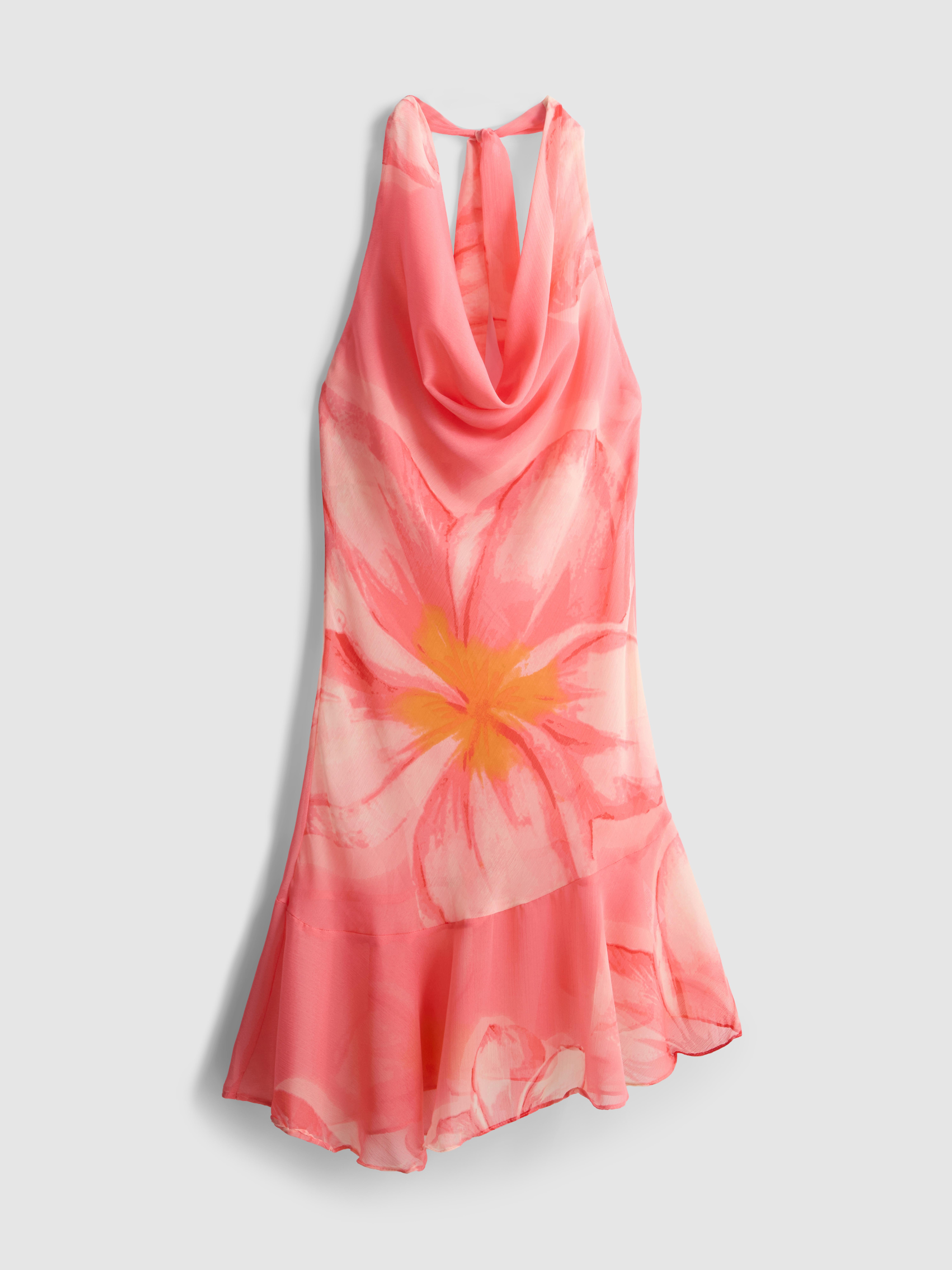 Vestido corto floral con escote halter y volantes