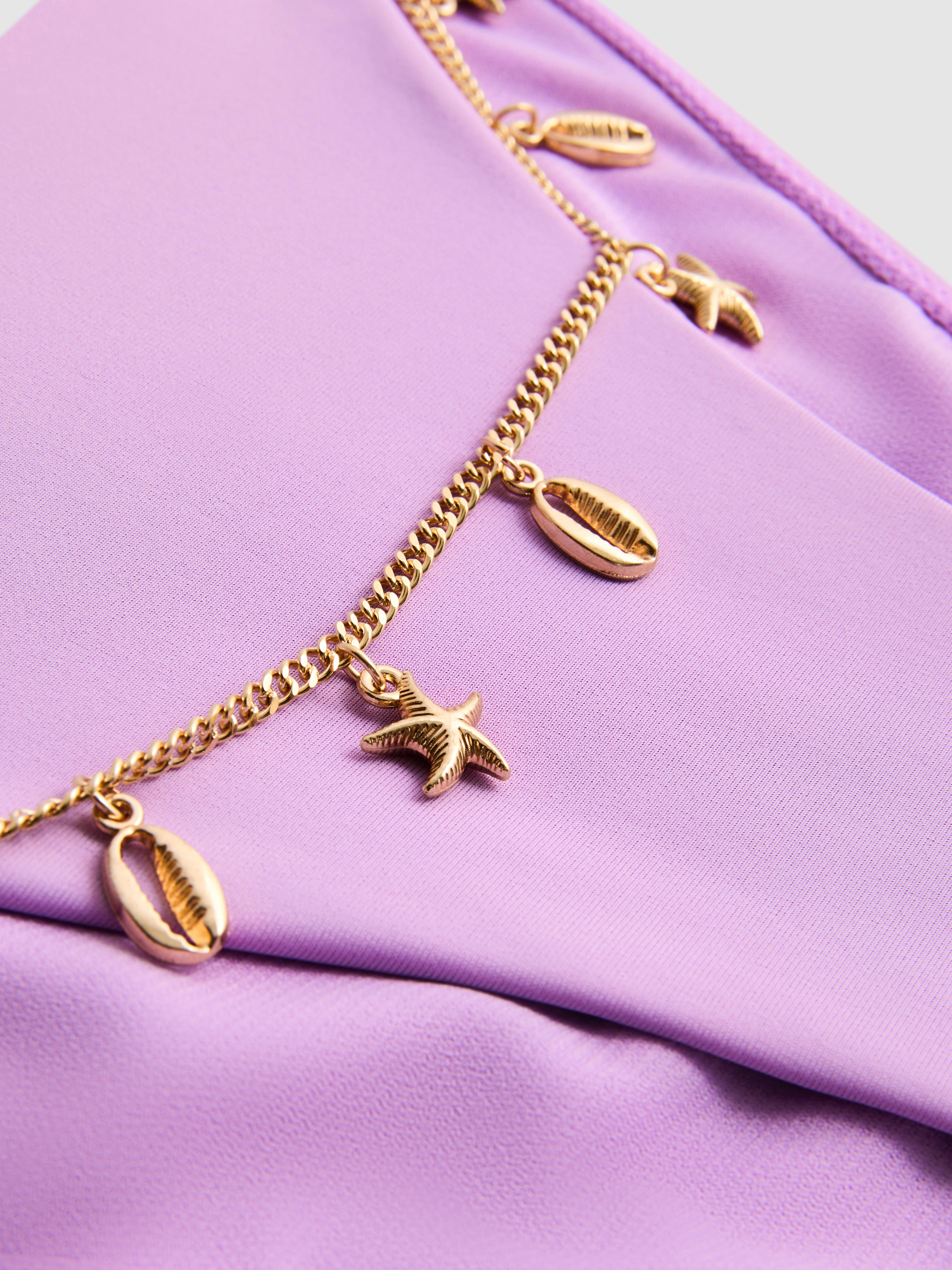 Oldalt megkötős bikinialsó lánccal díszítve